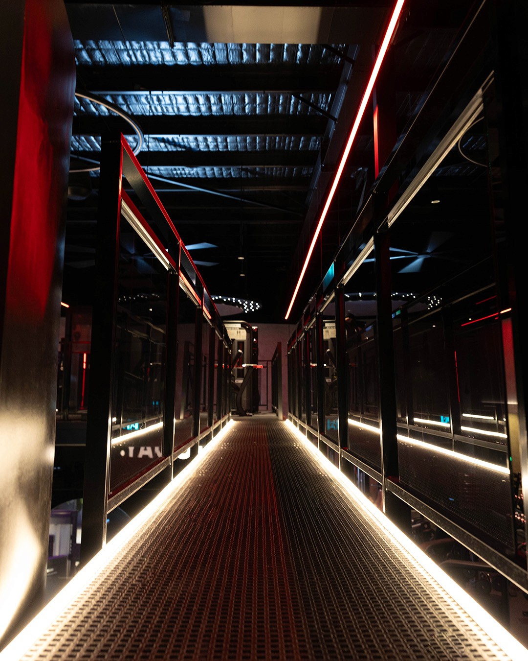 Rachel Stone standing with ABS and hands in her pockets