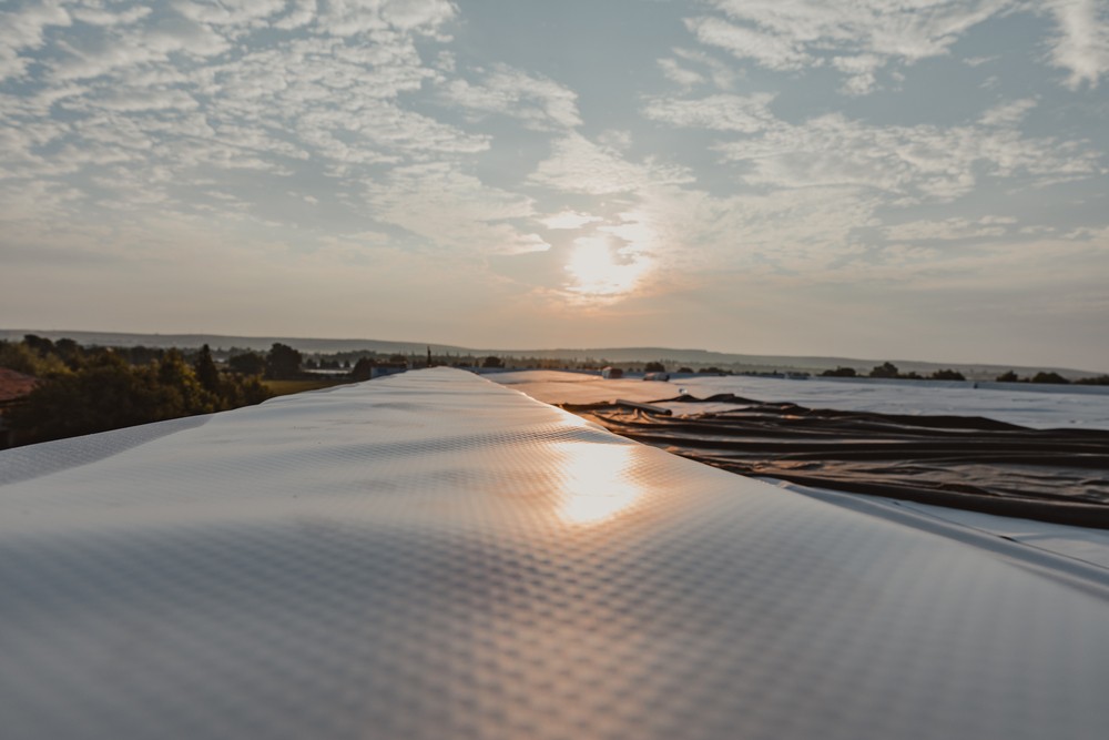 Water resistant tpo membrane positioned on the roof. PVC and rubber membrane