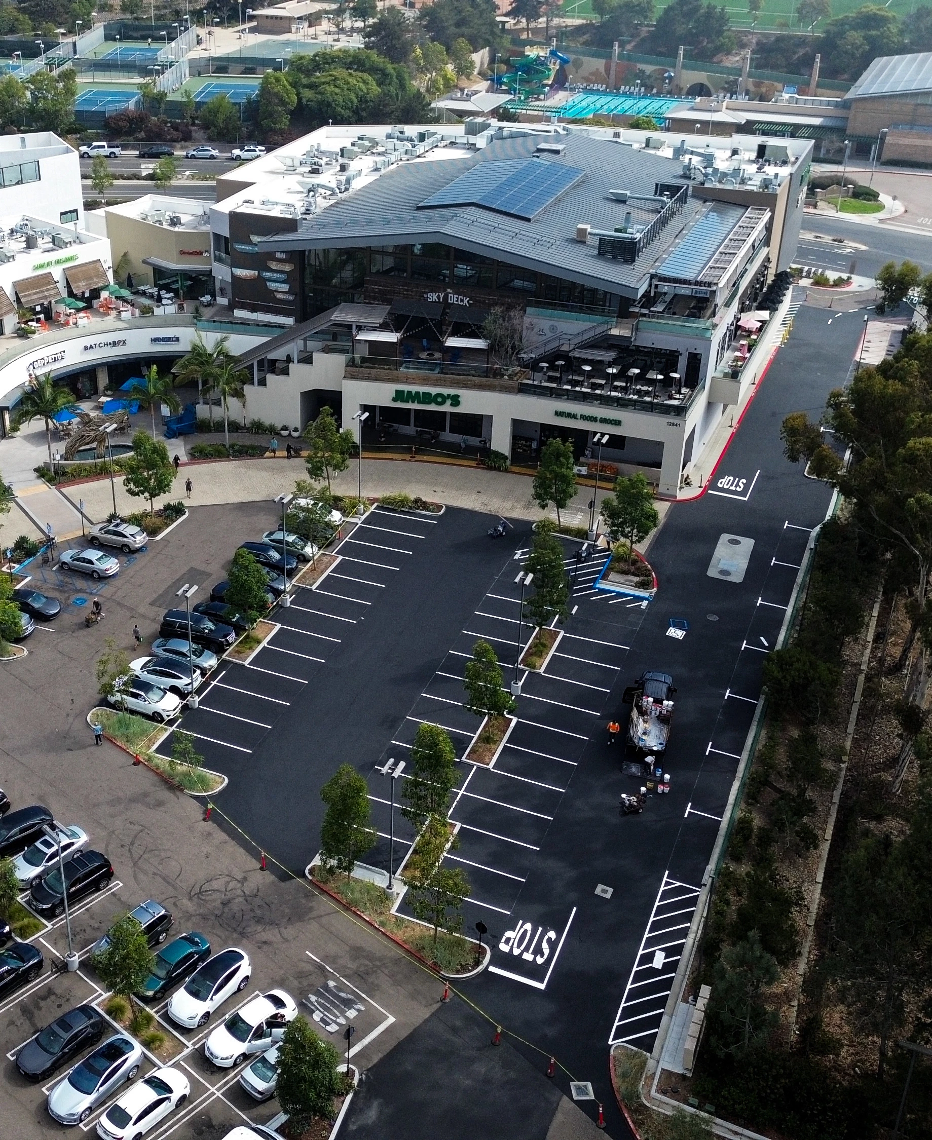 Aerial drone photo of shopping center parking lot project