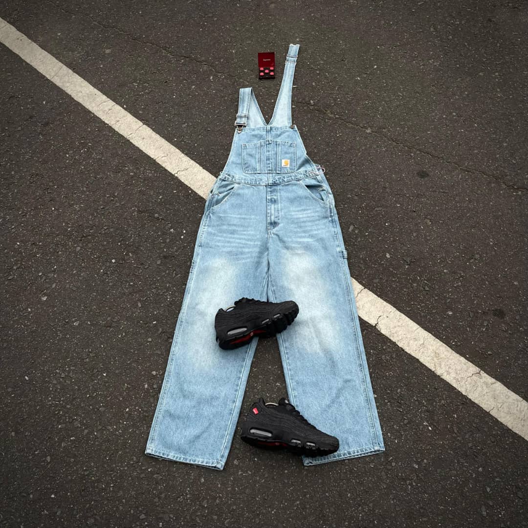 three assorted-color denim bottoms