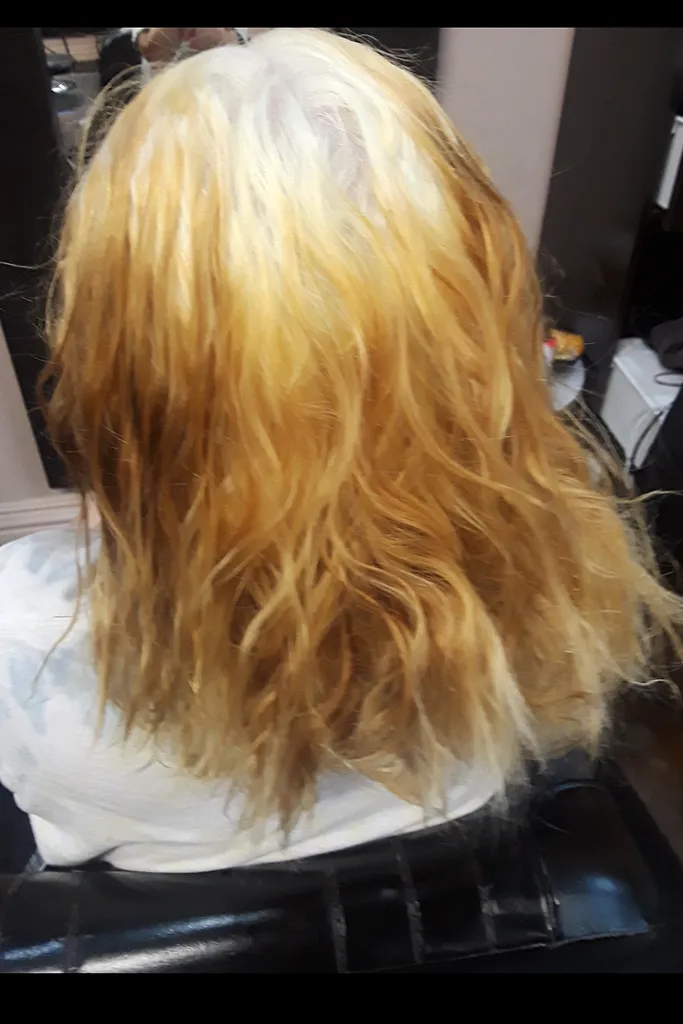 Long blonde hair transformation to cool platinum blonde