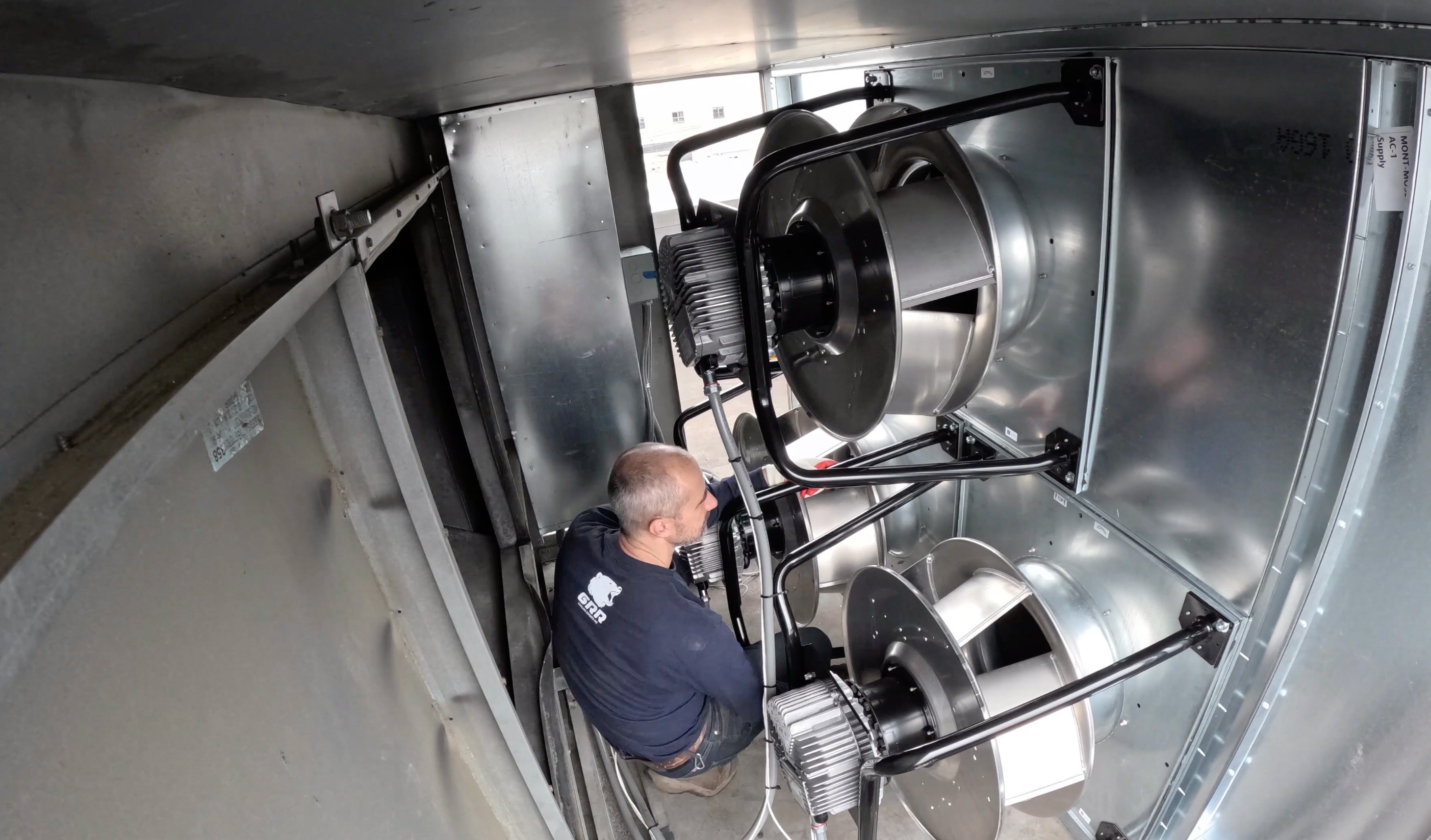 New direct-drive EC motor fan array installed by GRR Cooling Experts during an emergency HVAC retrofit in a critical NYC healthcare environment