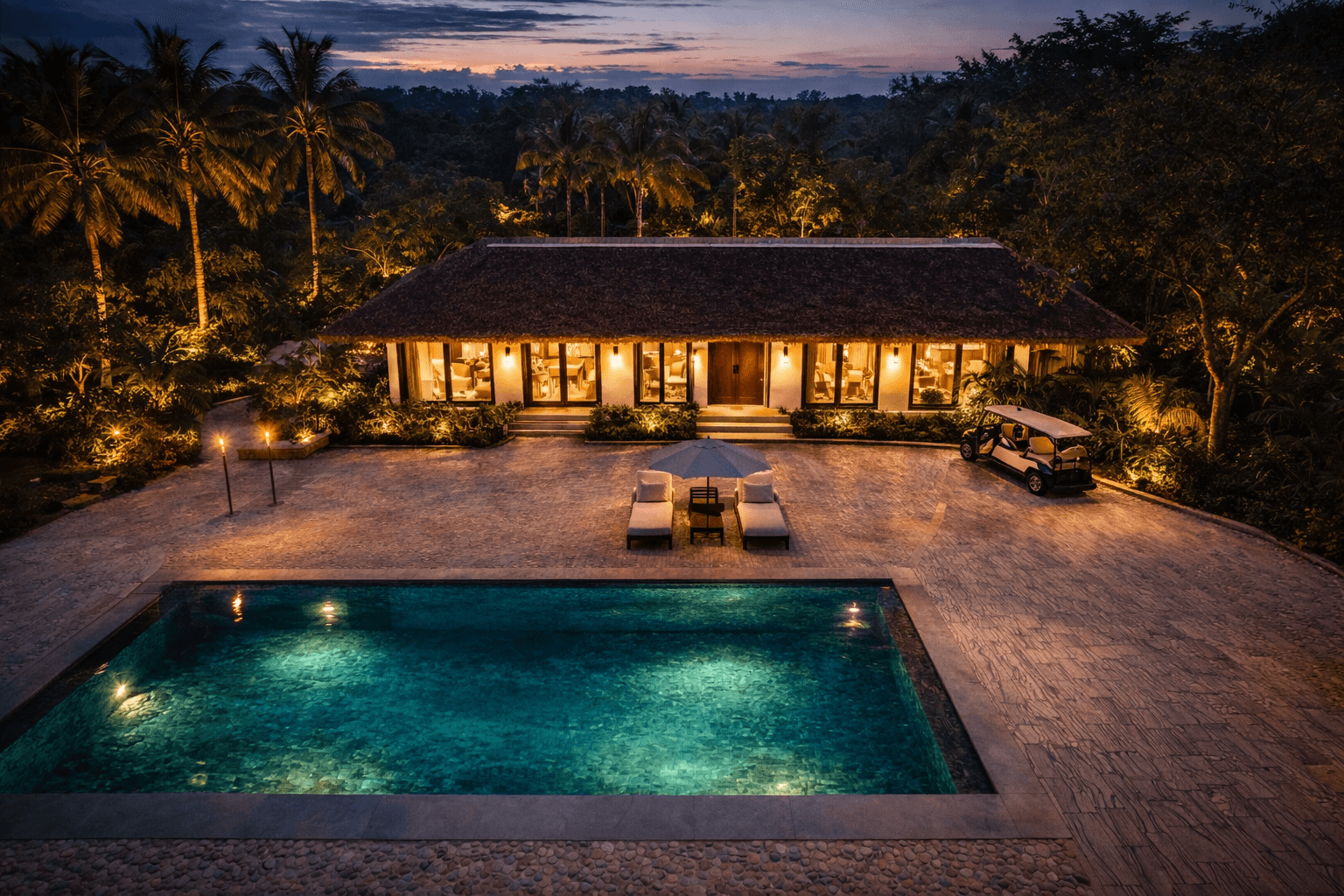 Natural stone flooring used in luxury poolside and outdoor landscape design