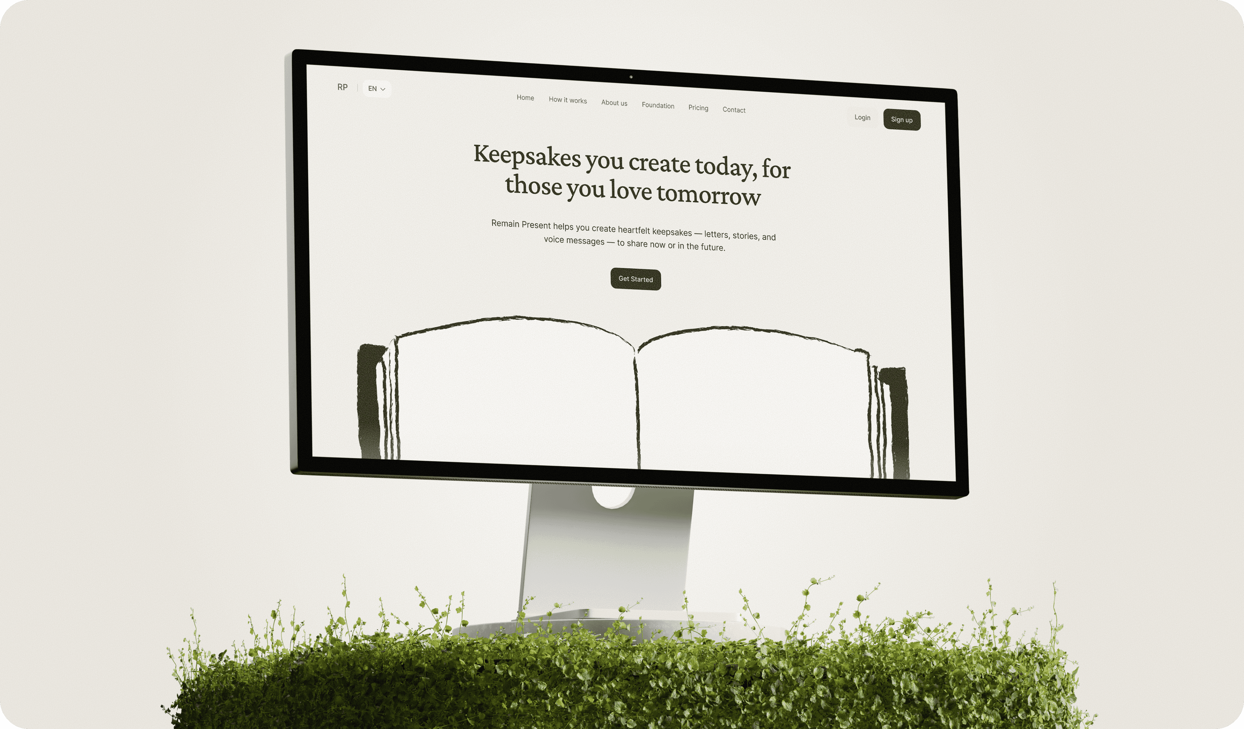 A digital billboard displays an open book with a quote above it, surrounded by green grass.