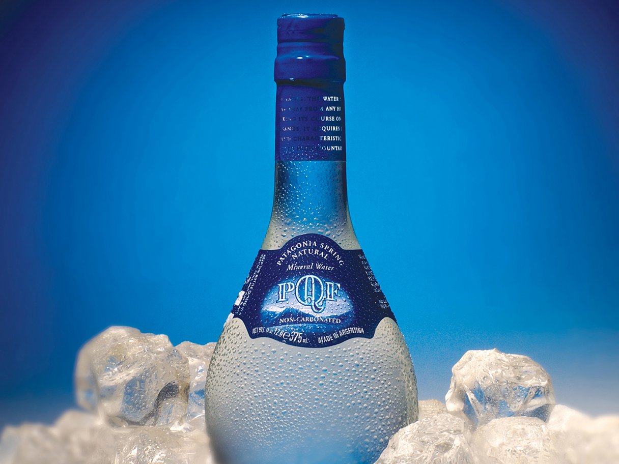 Rooftops of a coastal town with the sea in background