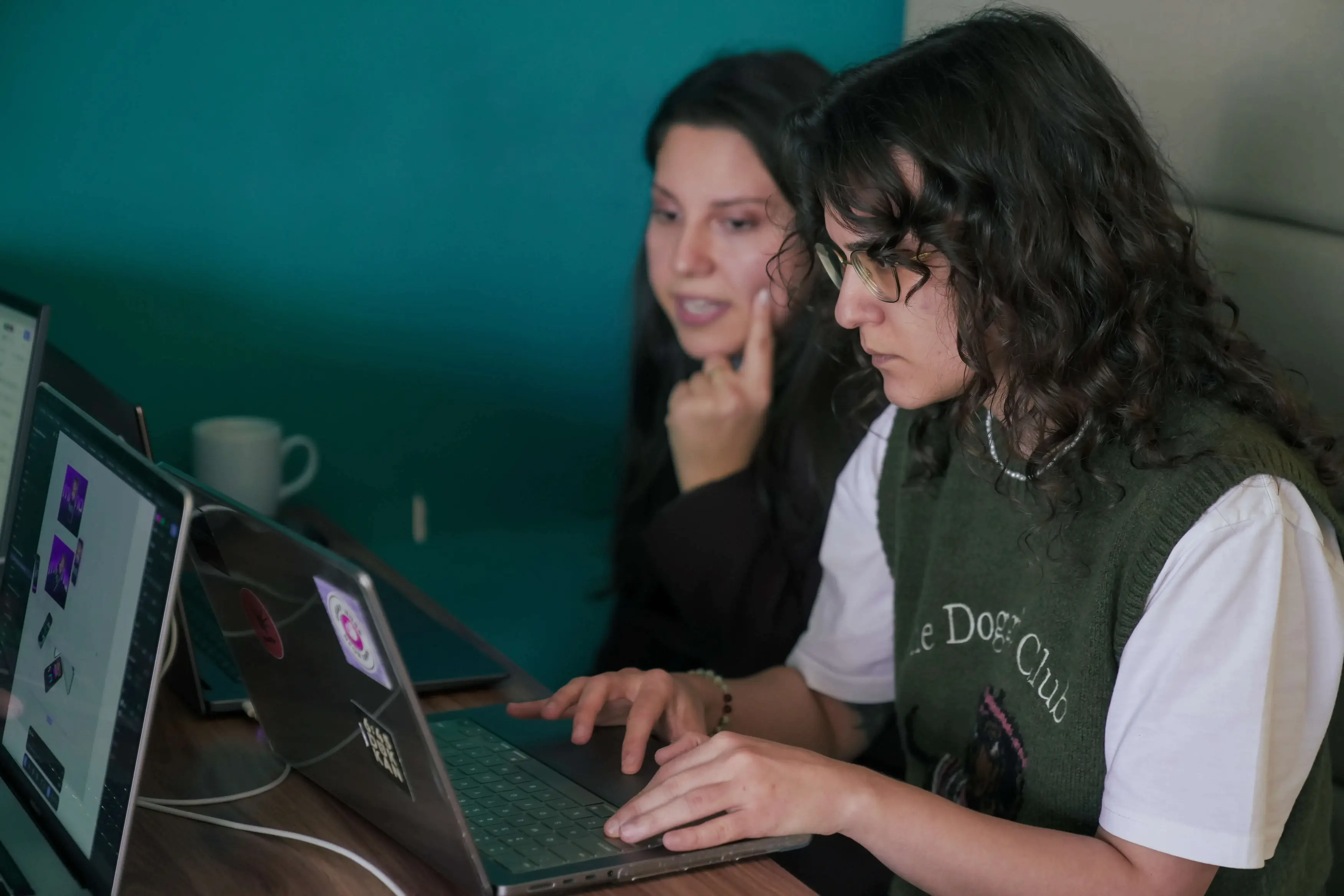 Teammates enjoying a casual work moment at Neon Apps