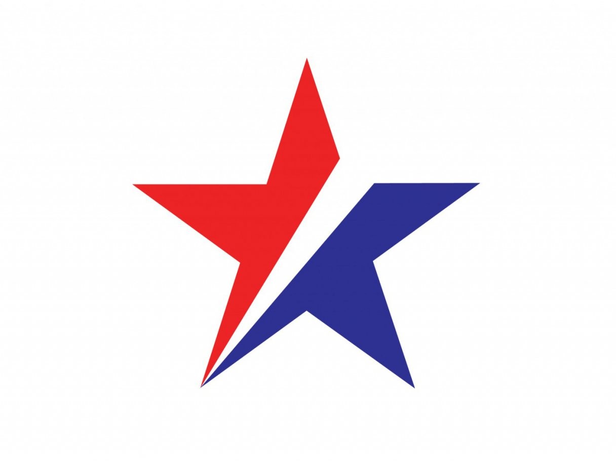 Rustic cabin in a golden field at sunset