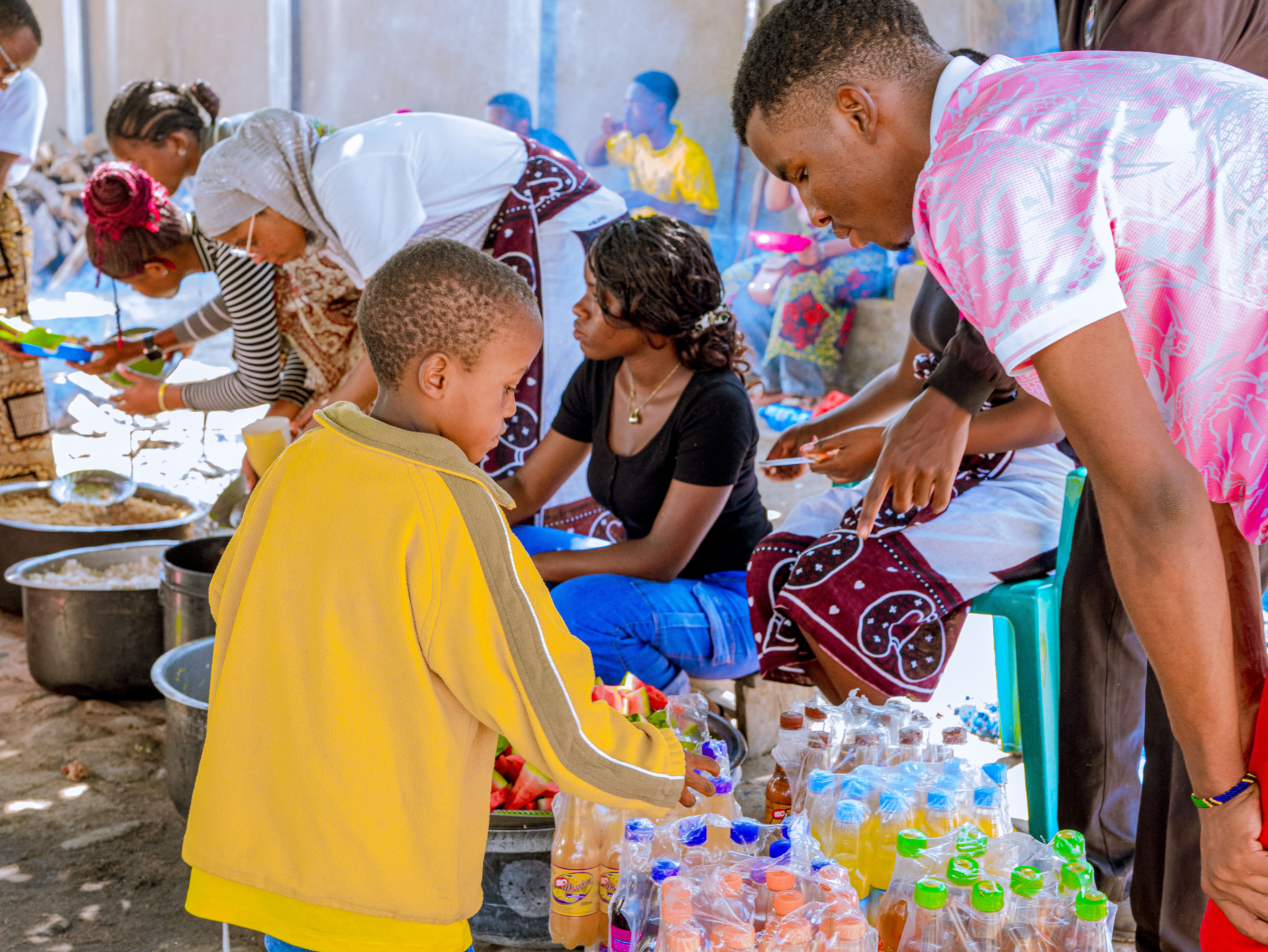 Kids Eating together with Ardent Hope Team