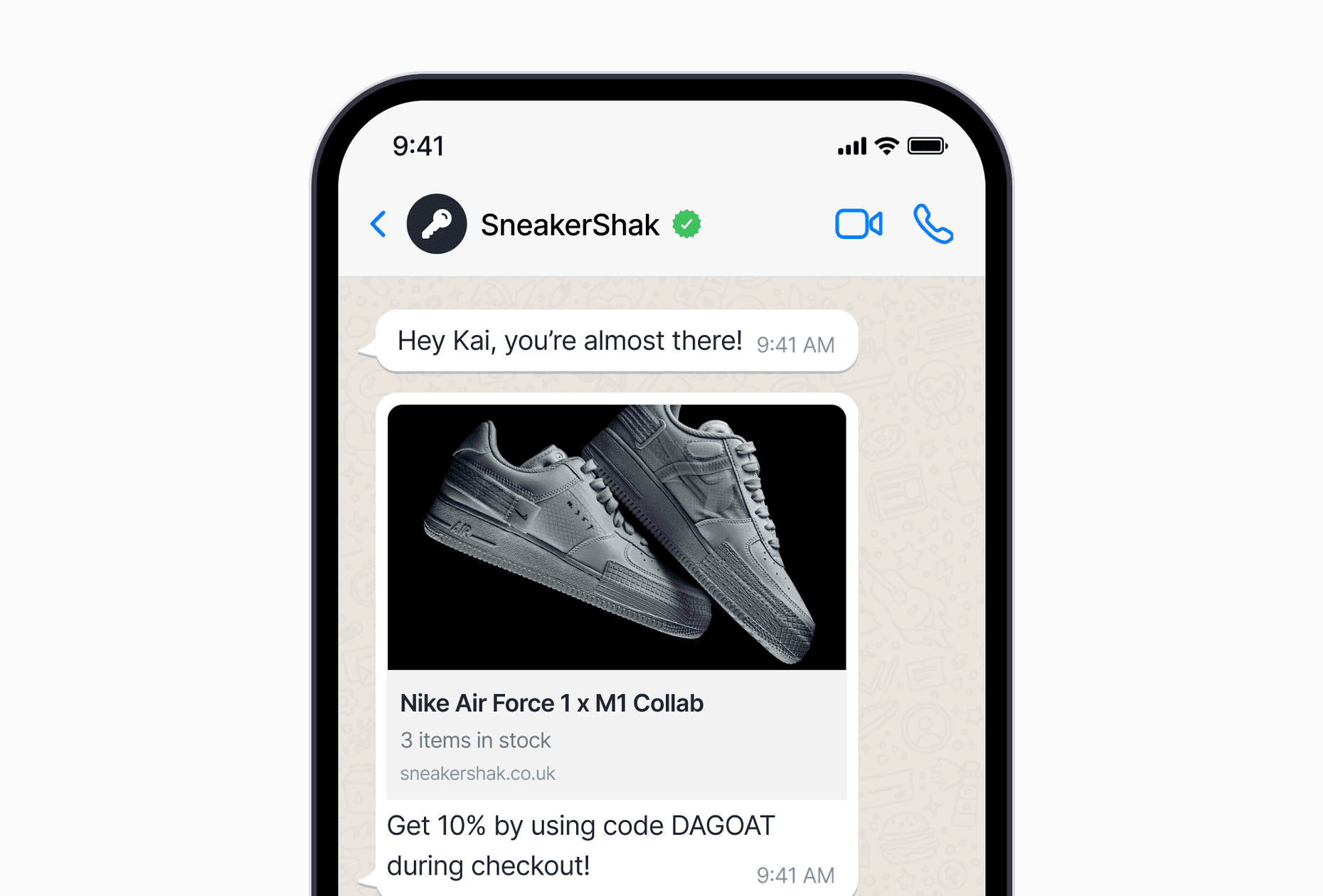 WhatsApp message sharing a discount code.