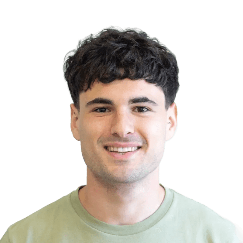 Portrait of Lucio, smiling and looking at the camera