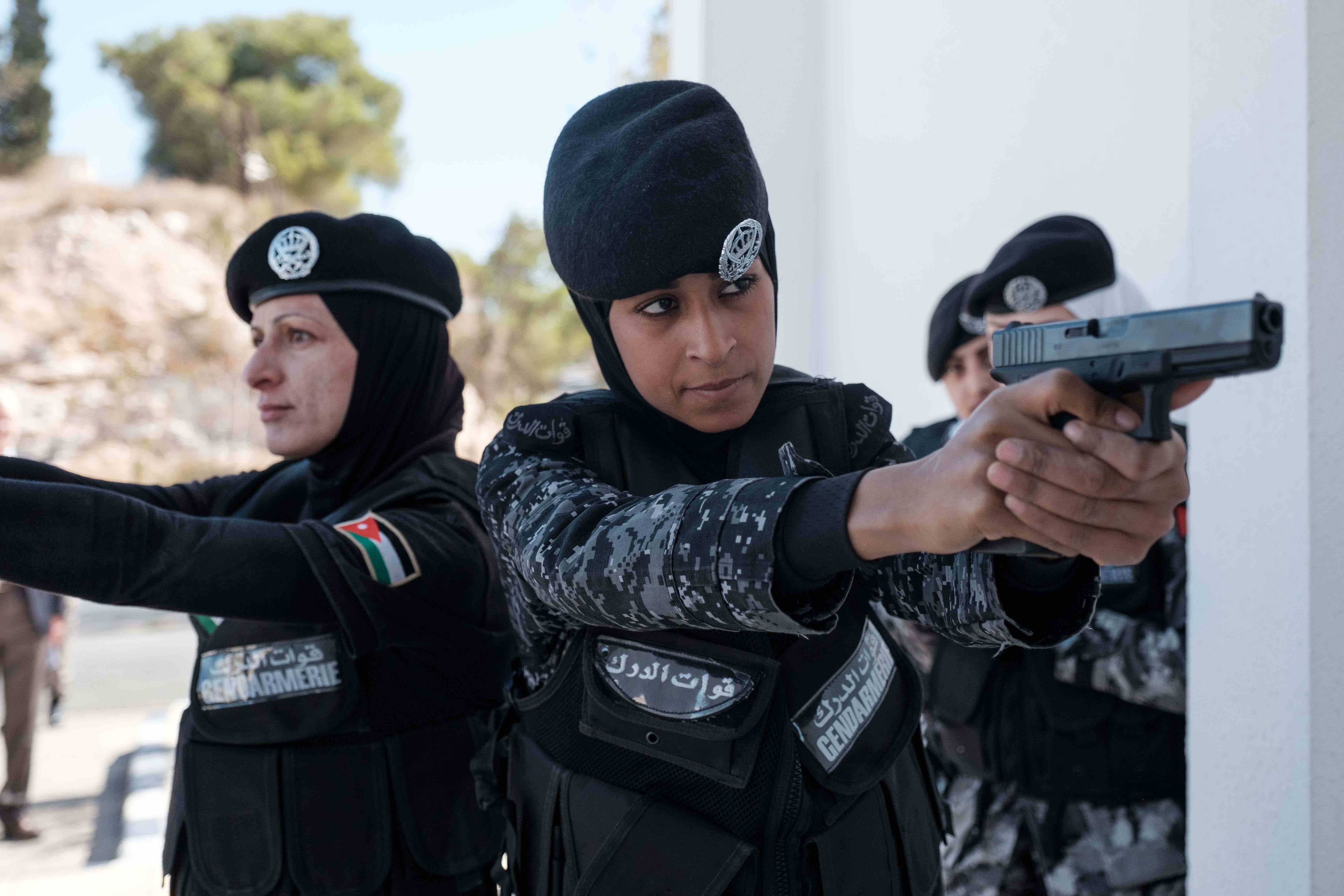 A group of women police conducting a tactical search exercise