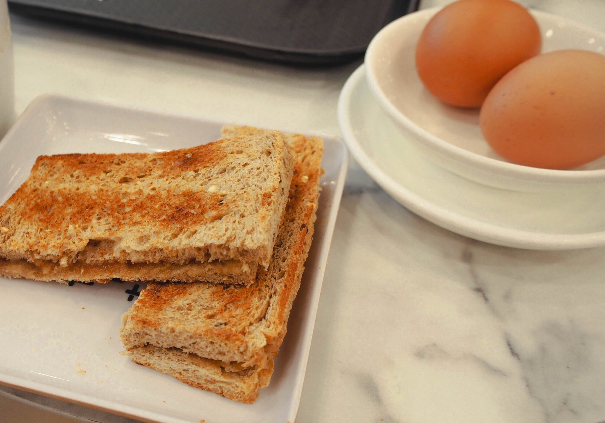 pancakes with berries on white ceramic plate