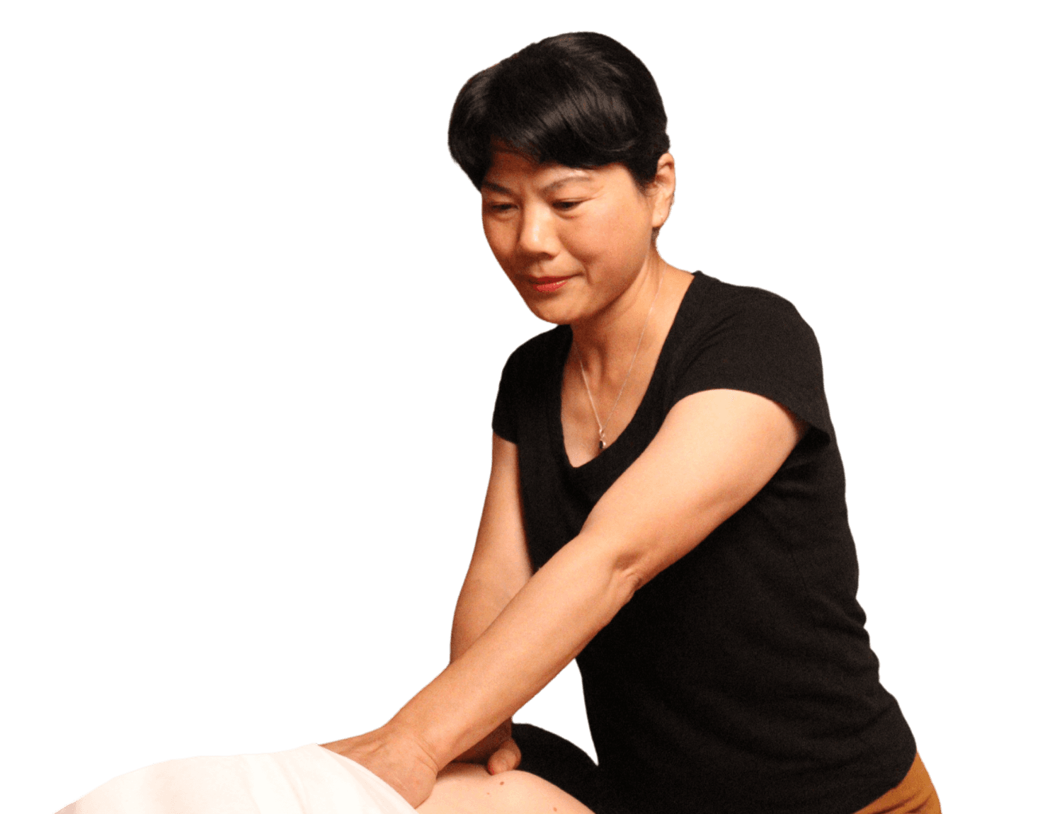 RMT therapist massaging a patient on a table