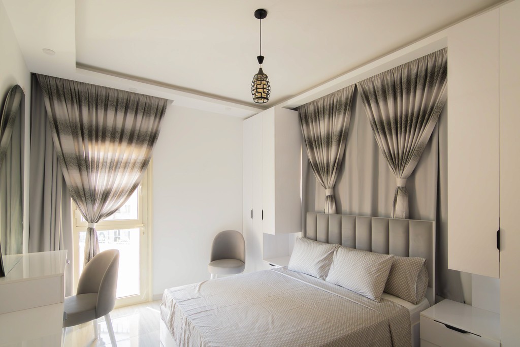 black and white wooden table and chairs