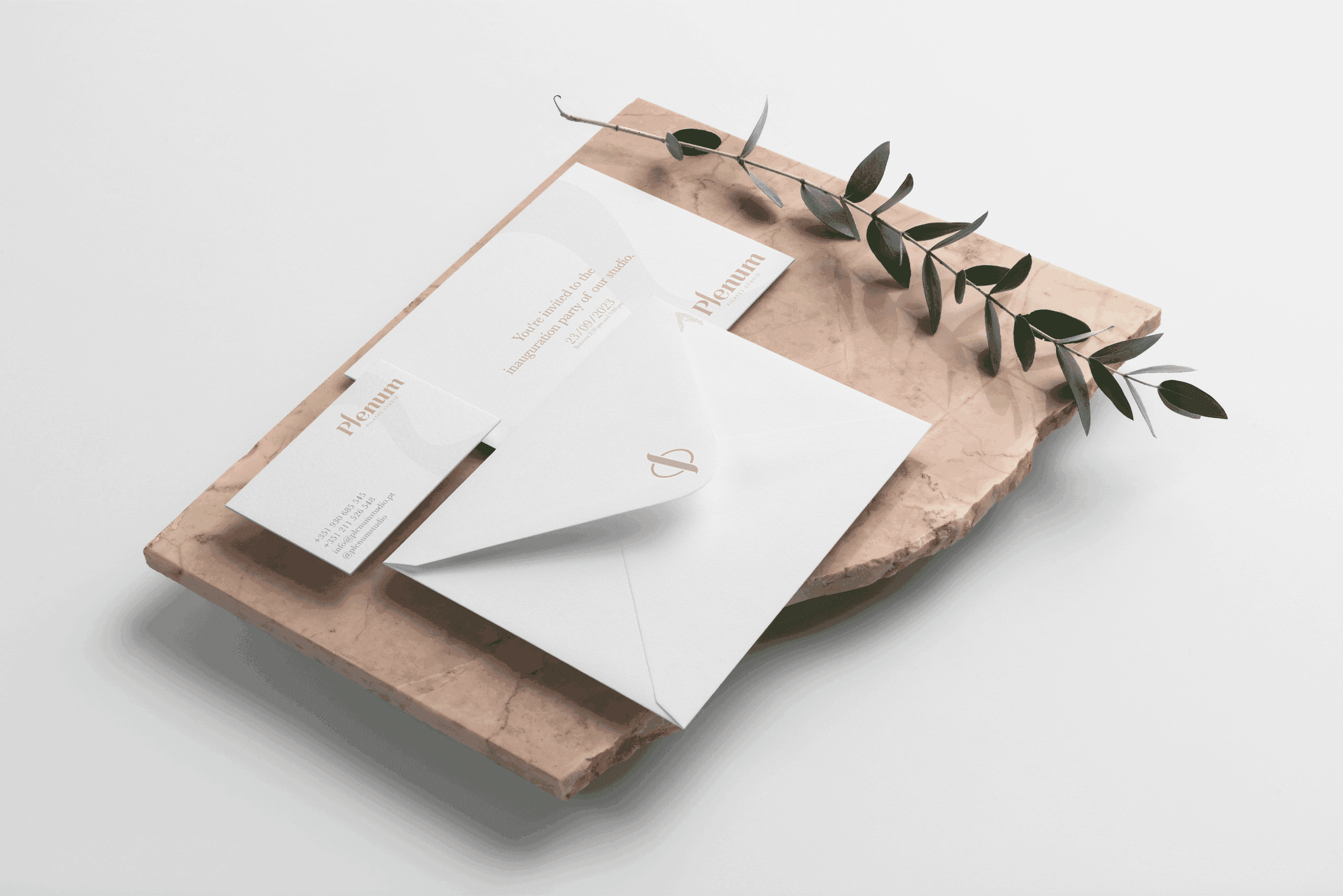 Brand identity stationery for Plenum Pilates Studio including invitation card, envelope and business card with elegant minimalist design.