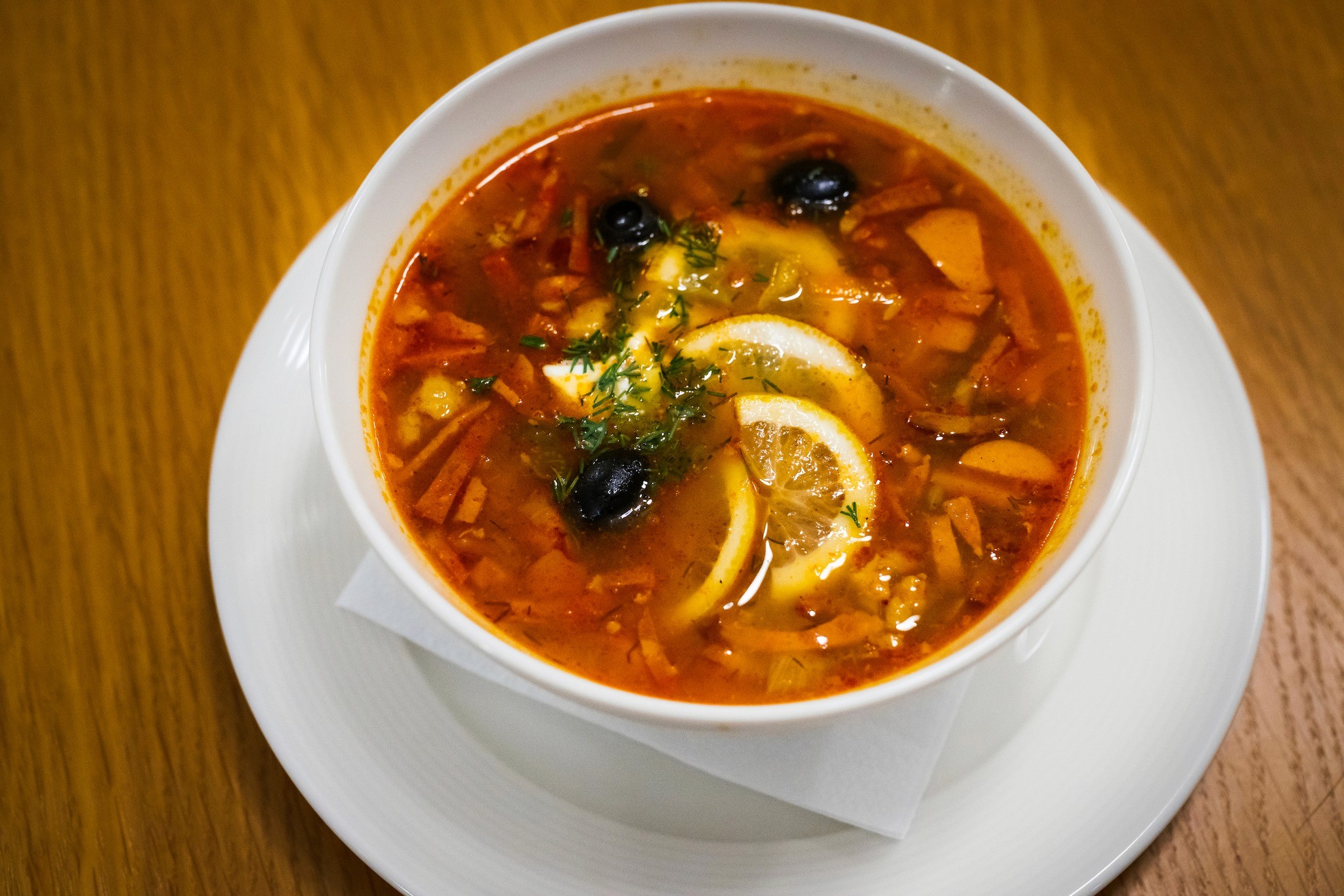 mantu served in a white plate