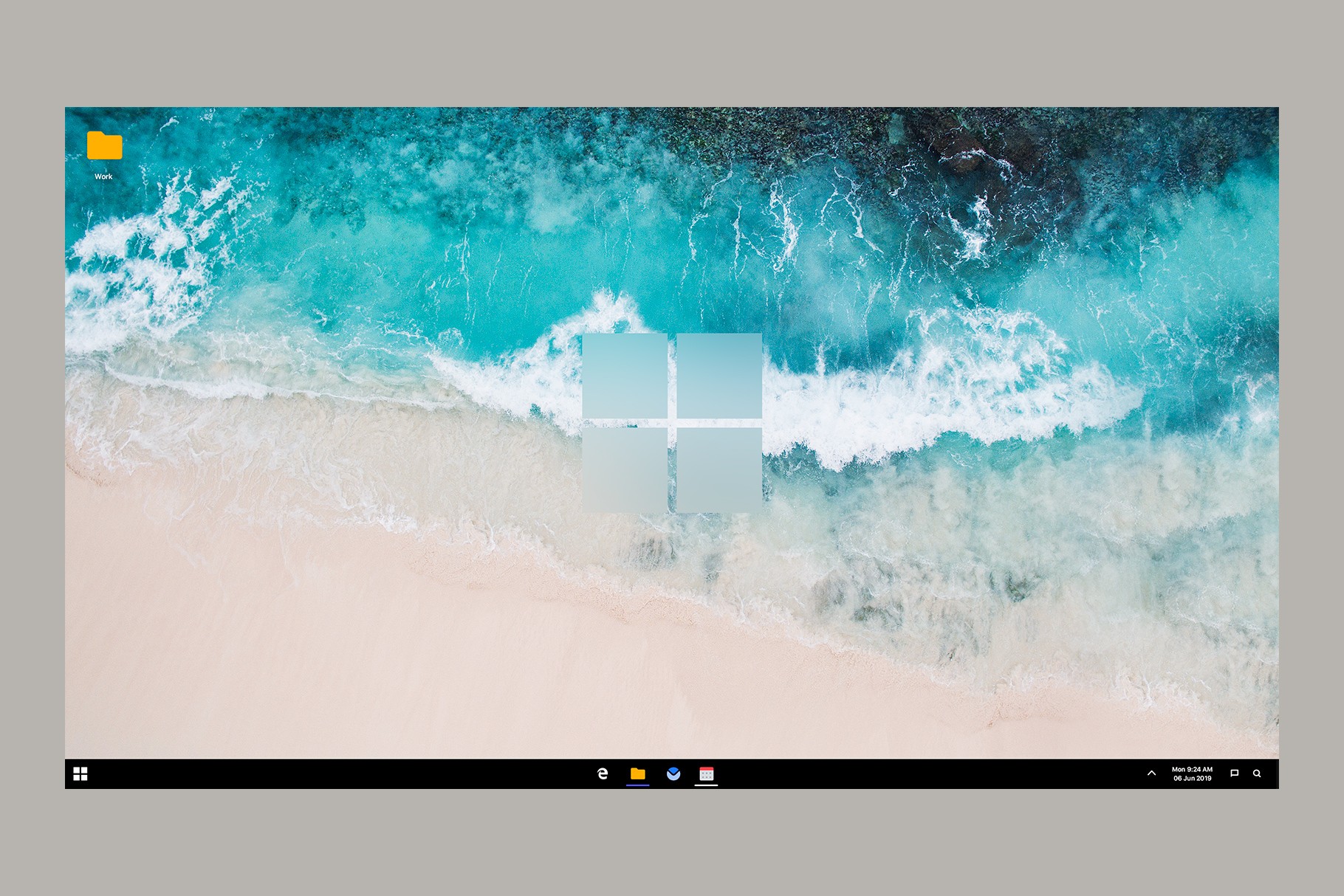 Windows 11 concept featuring a minimalistic desktop with a beach background.