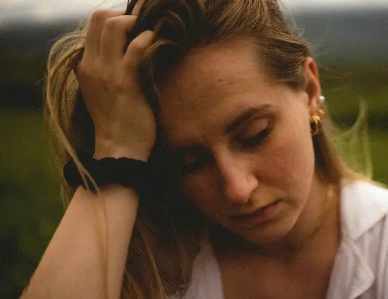 woman in white tank top