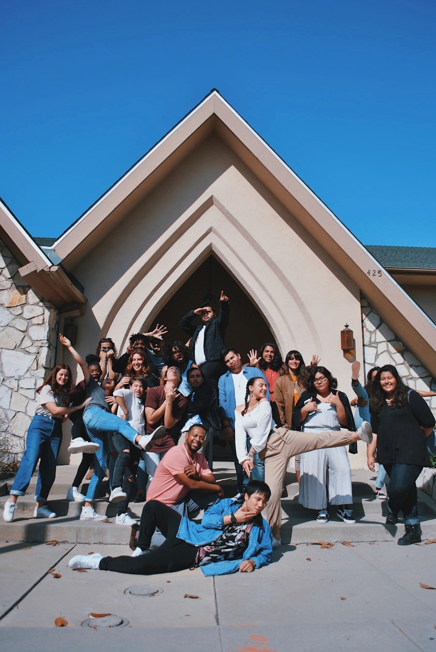 People gathered outside a house