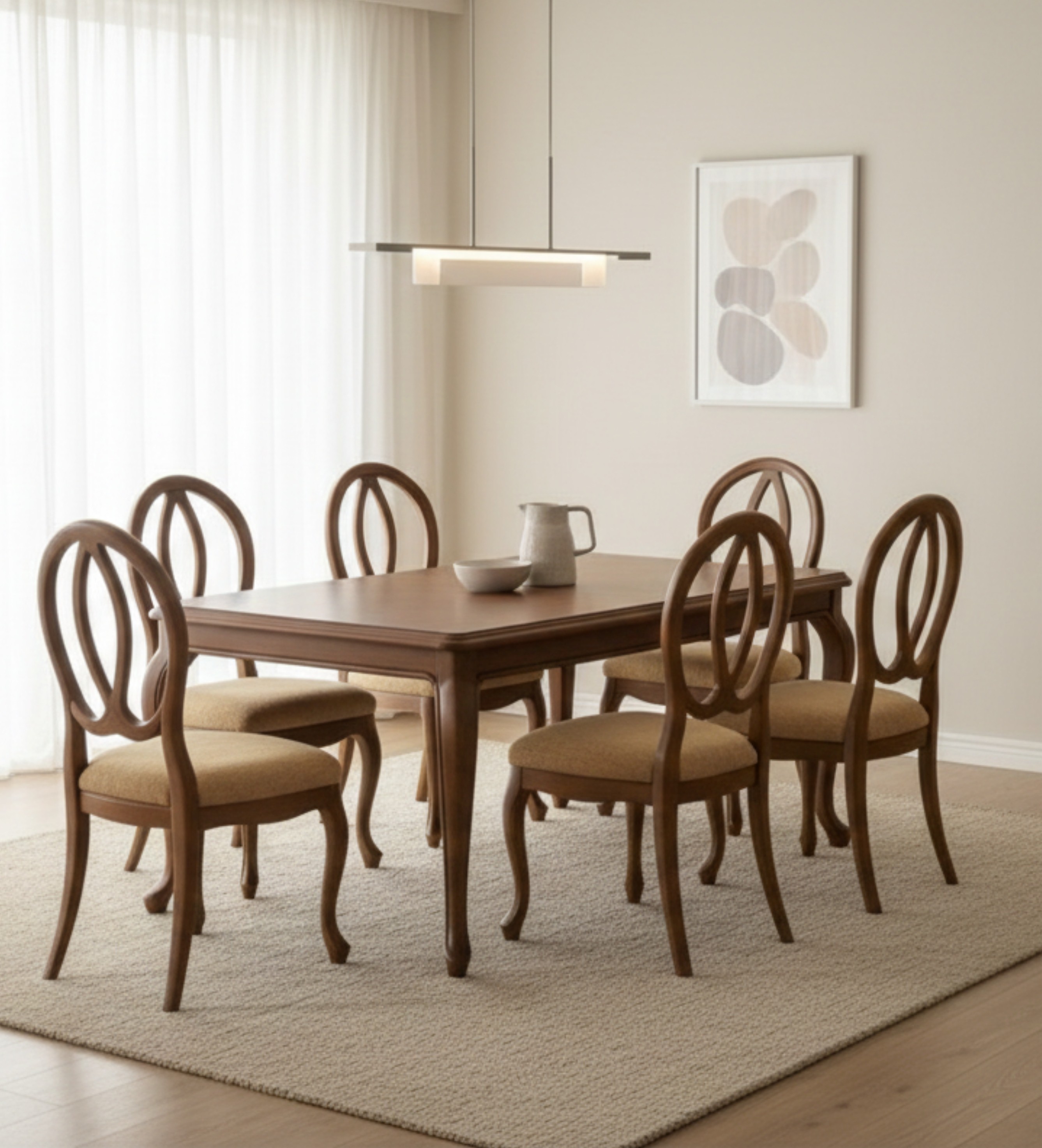 Luxury lounge seating with striped armchairs styled in a minimalist neutral interior