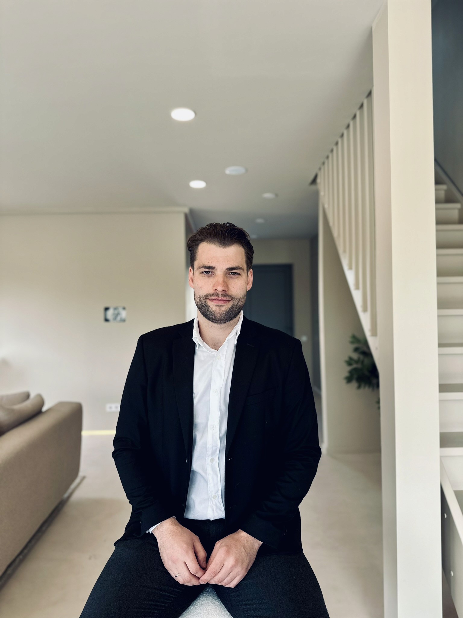 Portrait of Janis Udris, Project Developer at Grande Build, representing the leadership behind the Priežavoti Village tokenized real estate project near Riga.