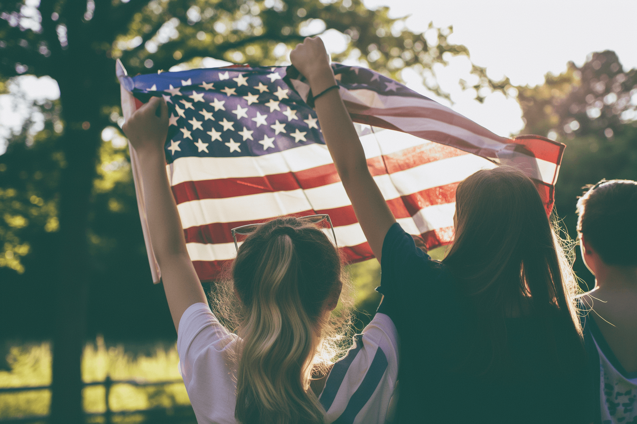 A group of children celebrating the American flag