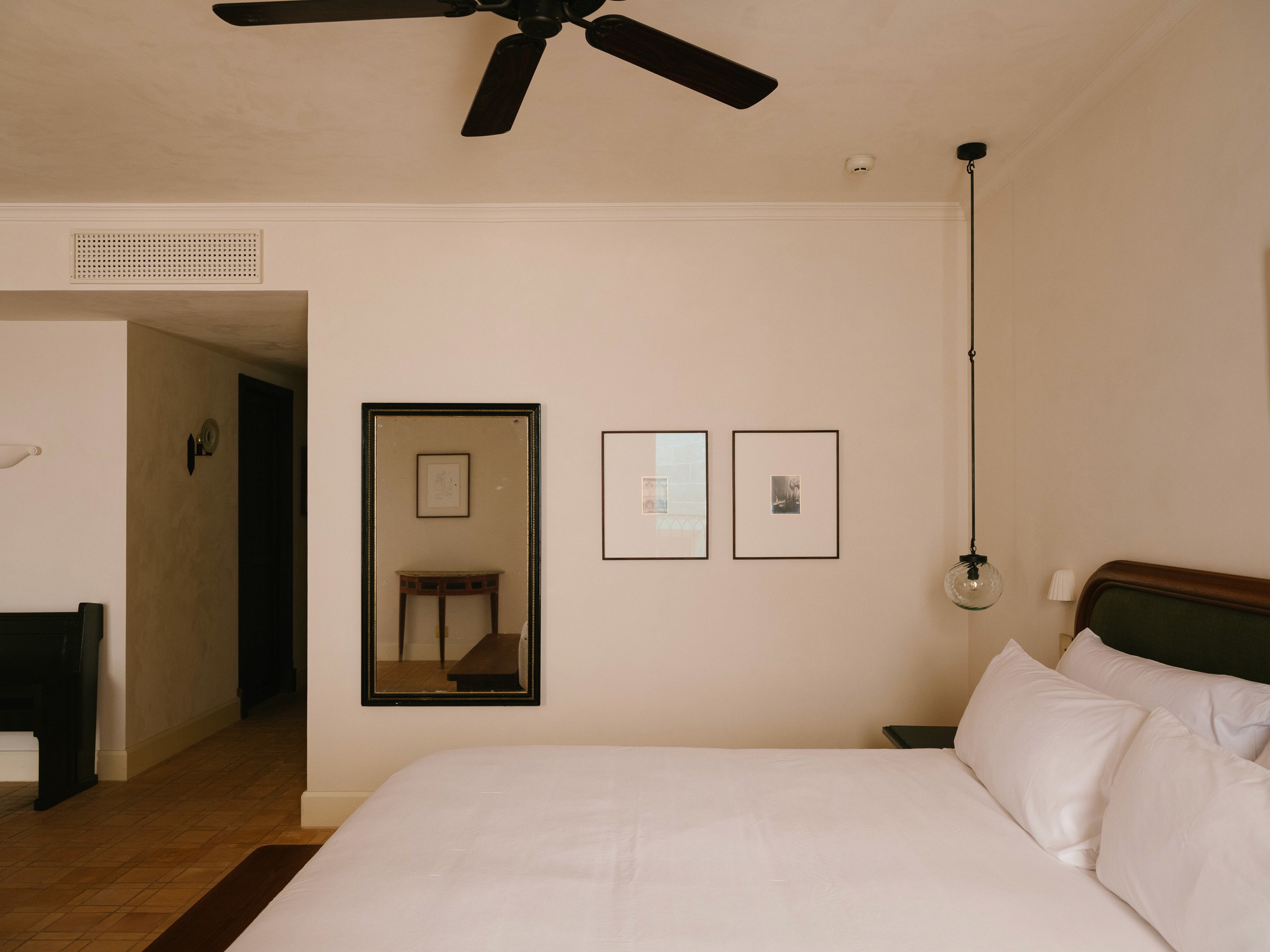 Streetside billboard with flyposters of the Batch.Works brand and illustrations