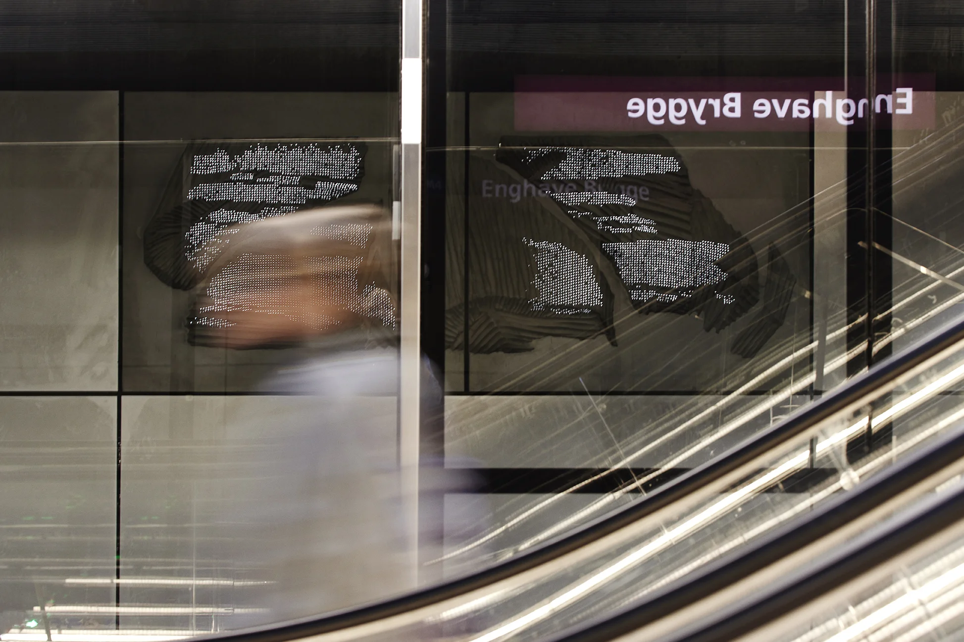 Installation photograph of the public commission work installed at Enghave Brygge Metro, Copenhagen. Concrete reliefs with optic fibers.