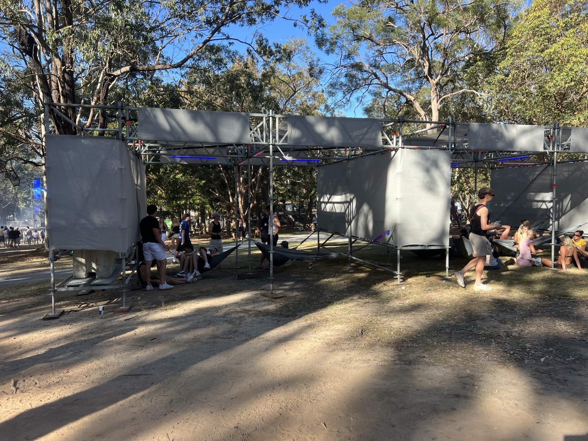 The hangout area, by day and by night. Same structure, different festival.