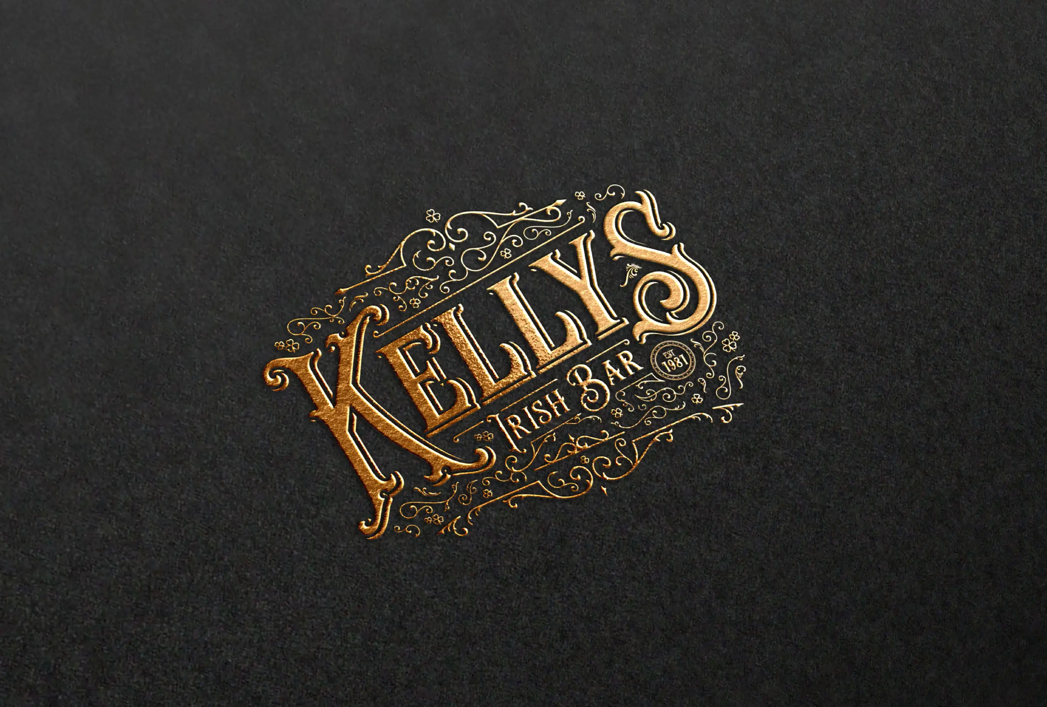 Looking up at modern skyscrapers against a cloudy sky.