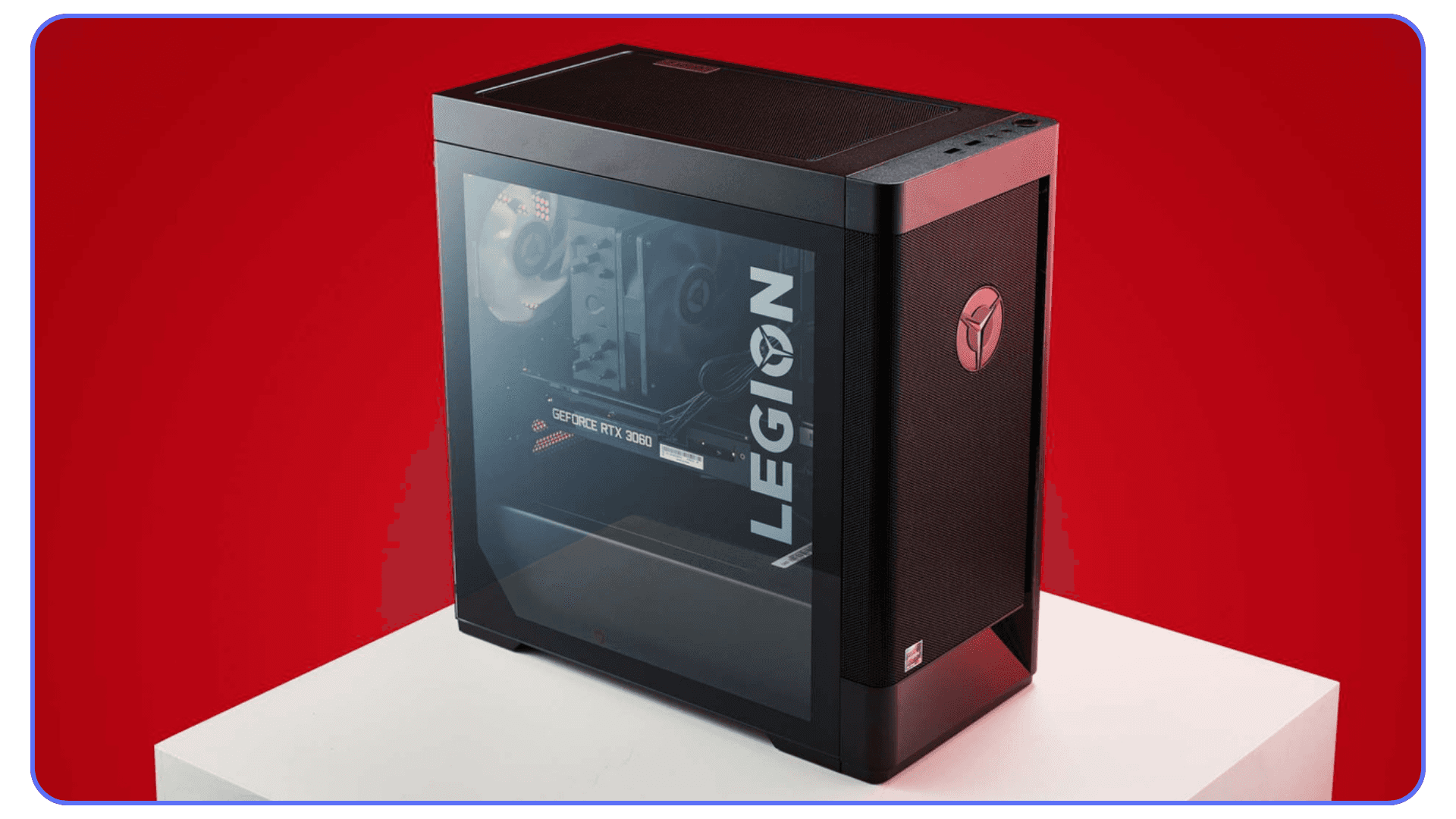 A Lenovo Legion desktop PC with a transparent side panel showcasing internal components, including an NVIDIA GPU, against a red background.