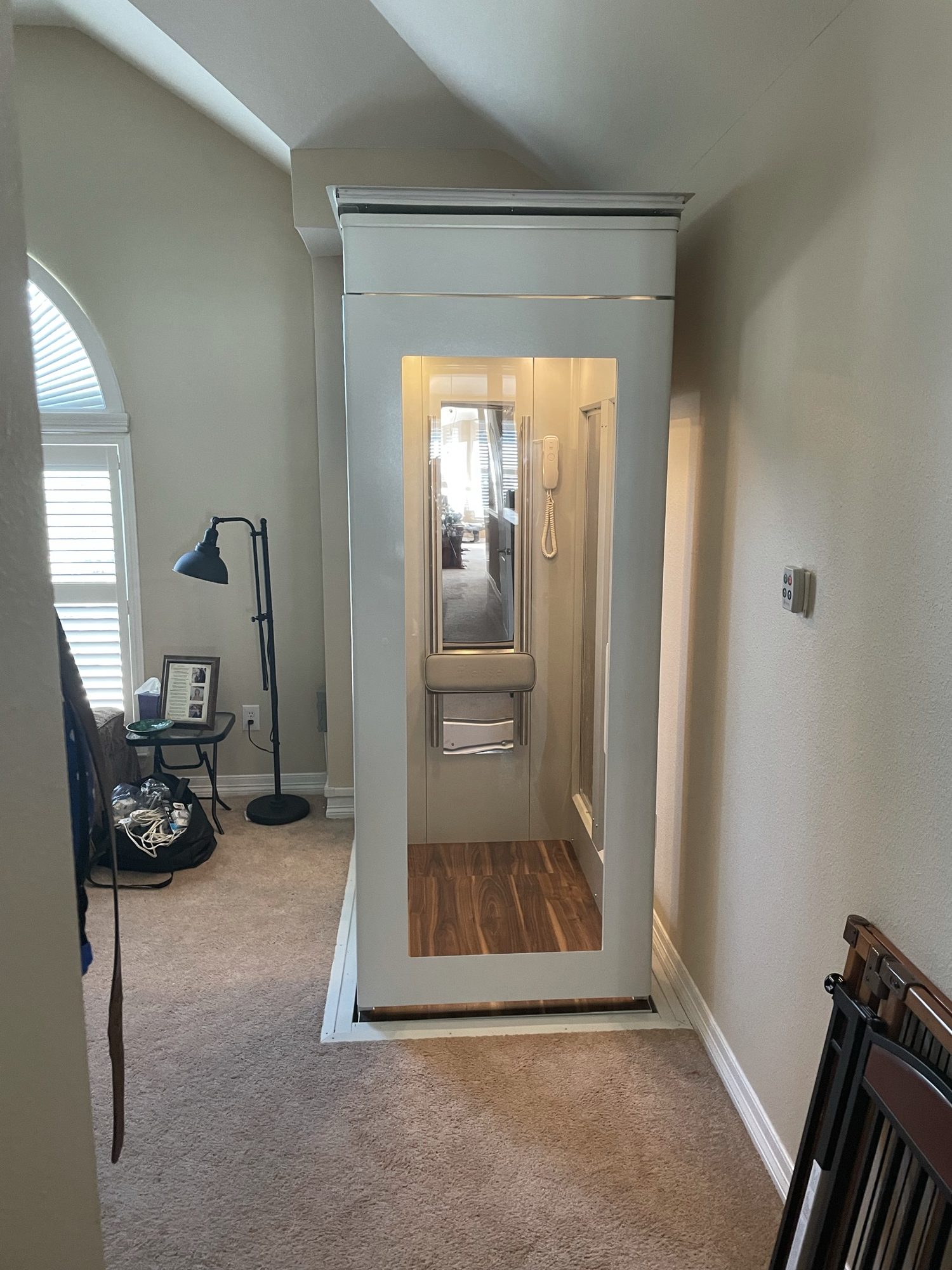 LiveWell installation, after: finished cream cab on an upstairs landing, door open