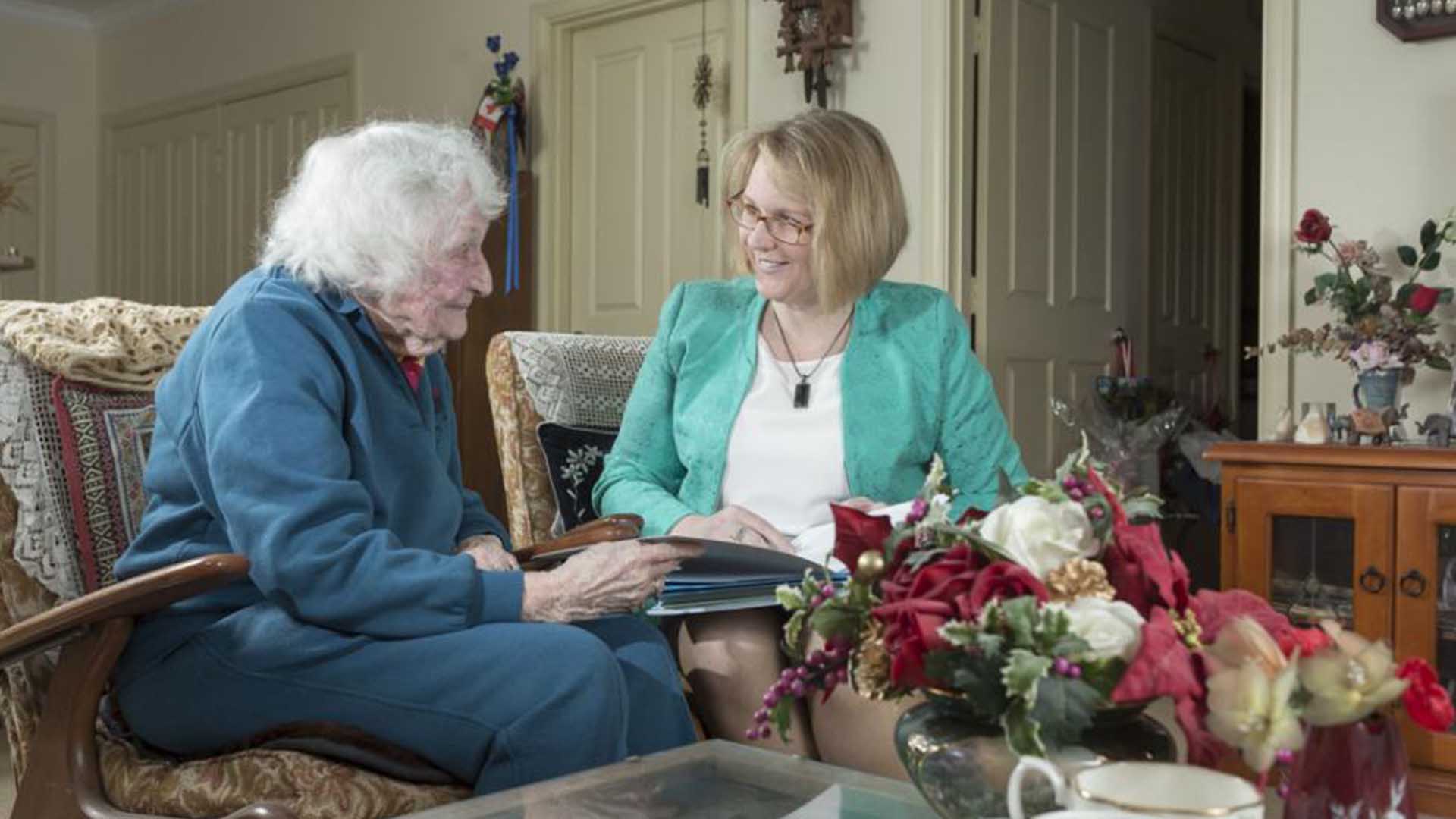Karen Walmsley Trident Accoutning Speaking with Elderly Client