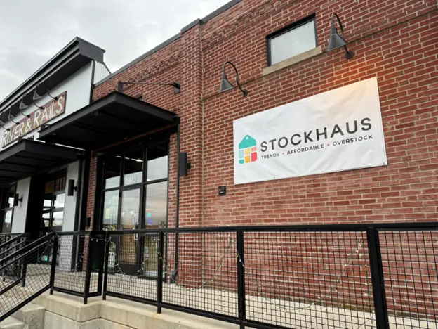 Stockhaus home goods store exterior with brick facade, signage, and modern storefront entrance.