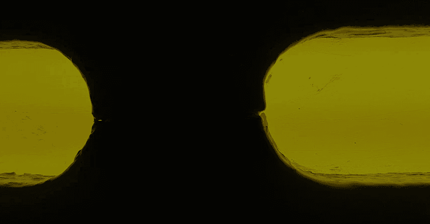 Abstract, motion-blurred image with warm brown and amber tones, creating a sense of movement and depth.