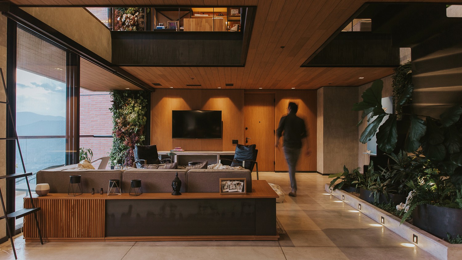 Organic architectural forms with warm wood tones and flowing ceiling structure