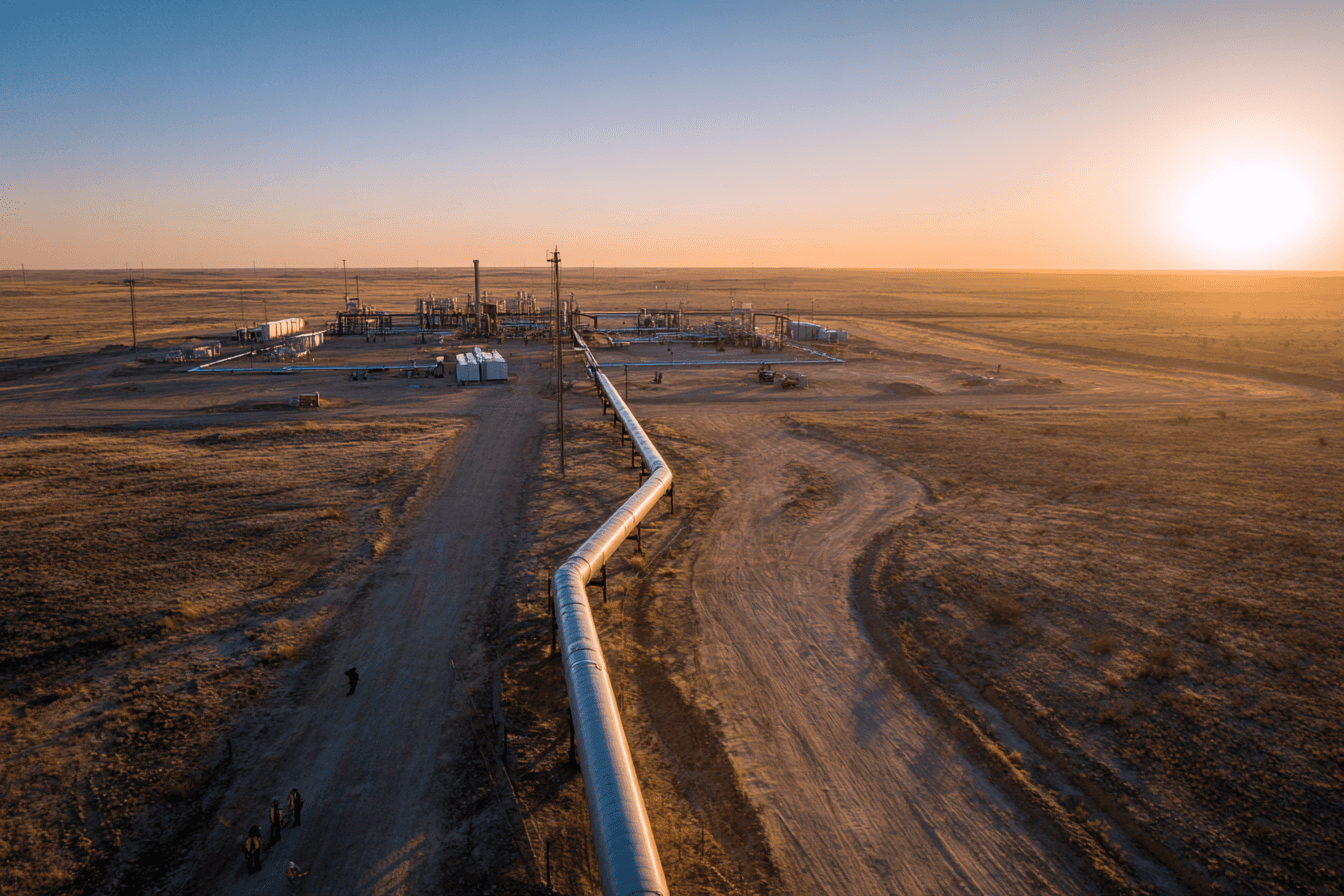 Man with a laptop walking to a store