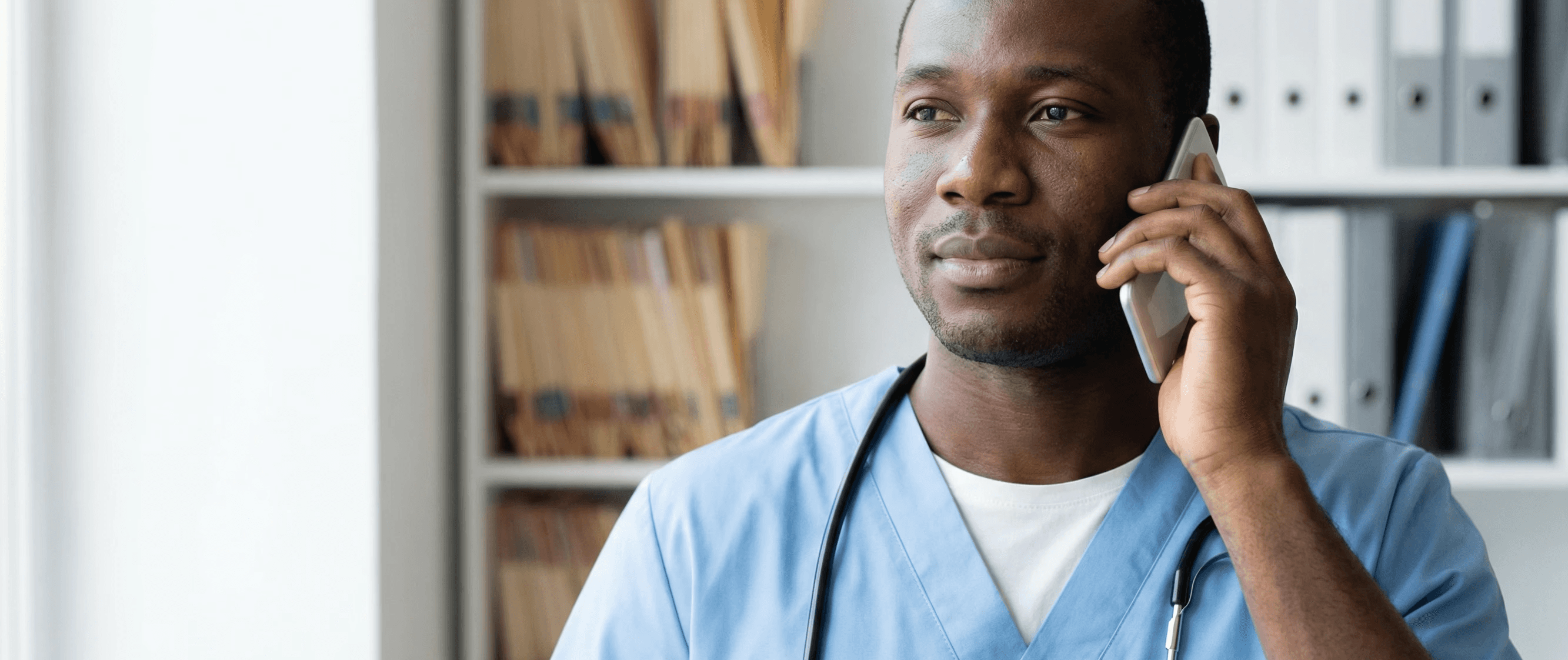 A male doctors taking a call