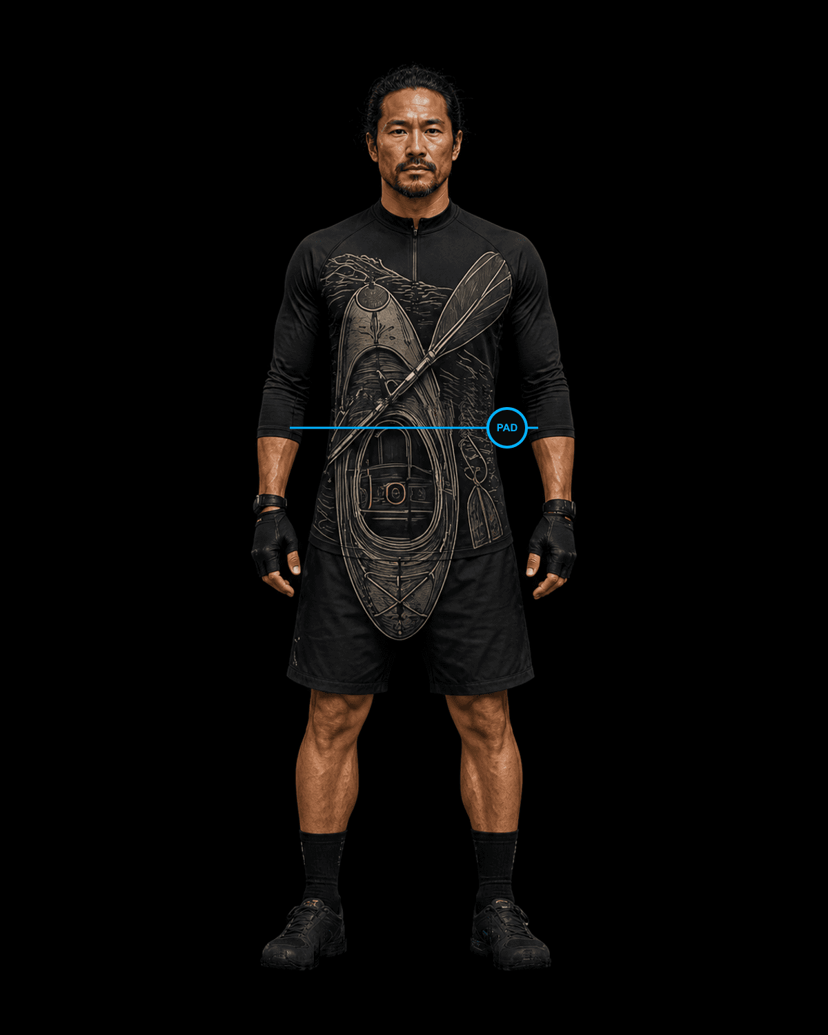 Front view of a male river paddler wearing the black Valkyrie Formation paddle kit concept with an engraved kayak hull, cockpit and paddle blades.