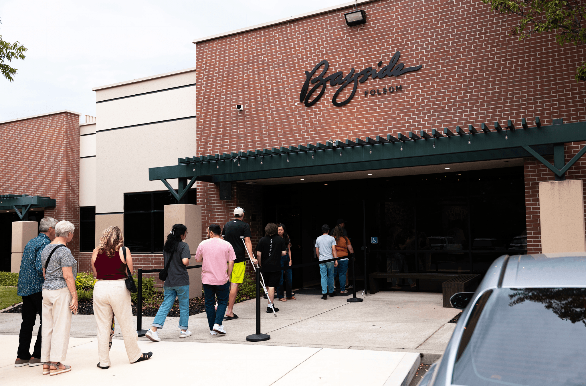 husband and wife working happily on a laptop