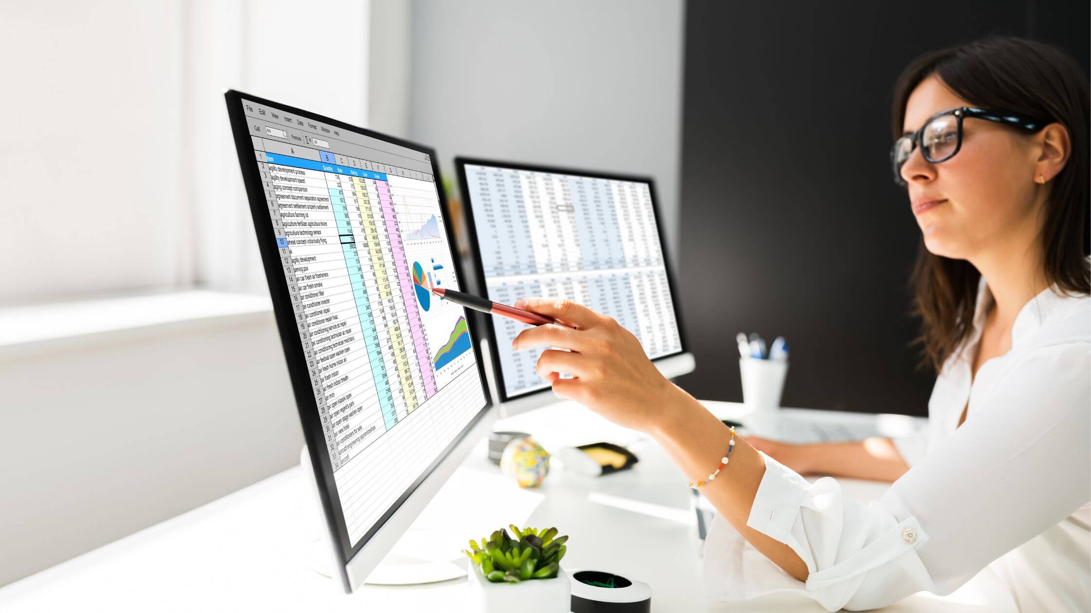 woman creating charts - How to Count Rows in Google Sheets