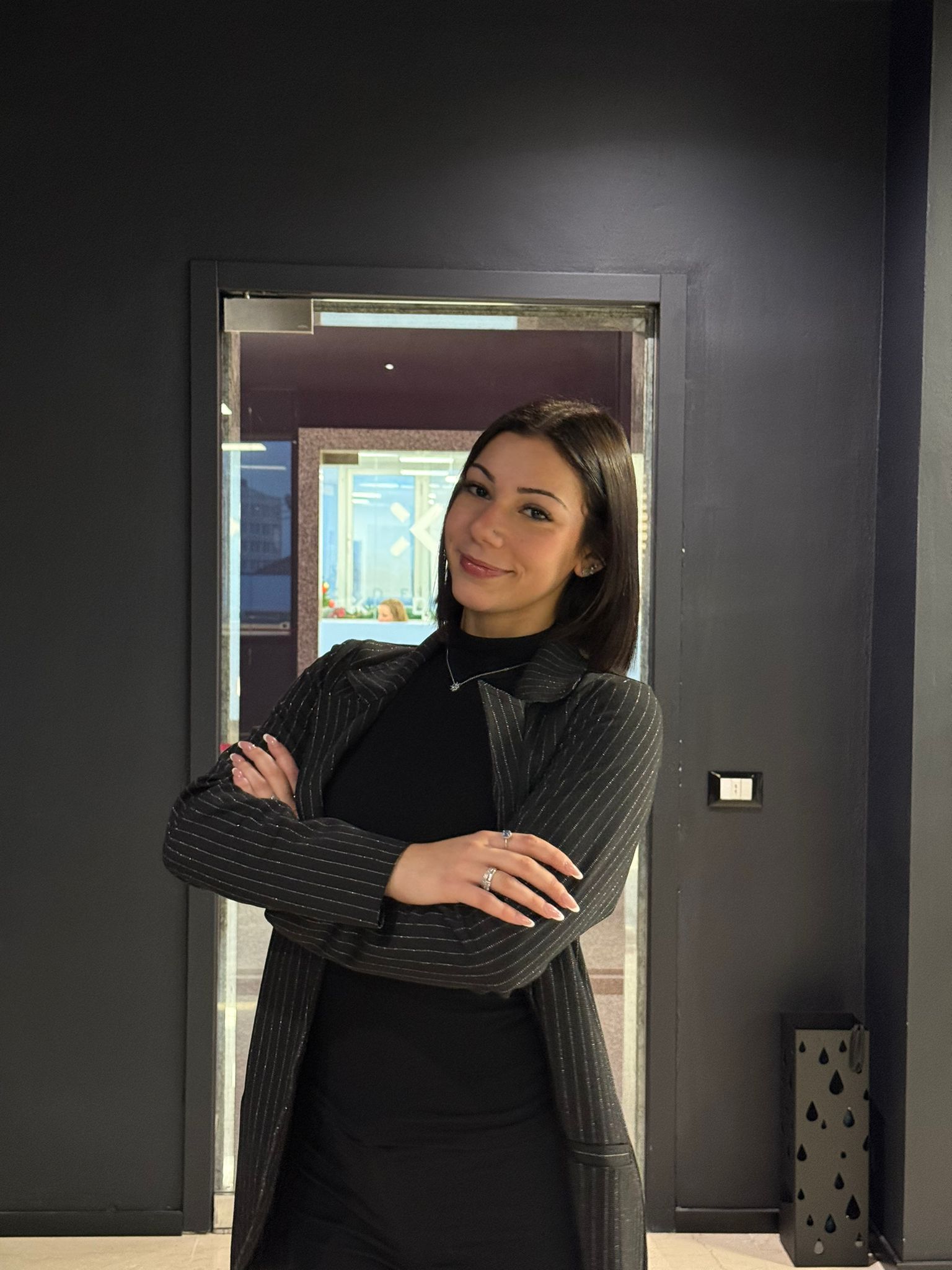 smiling woman in black tank top