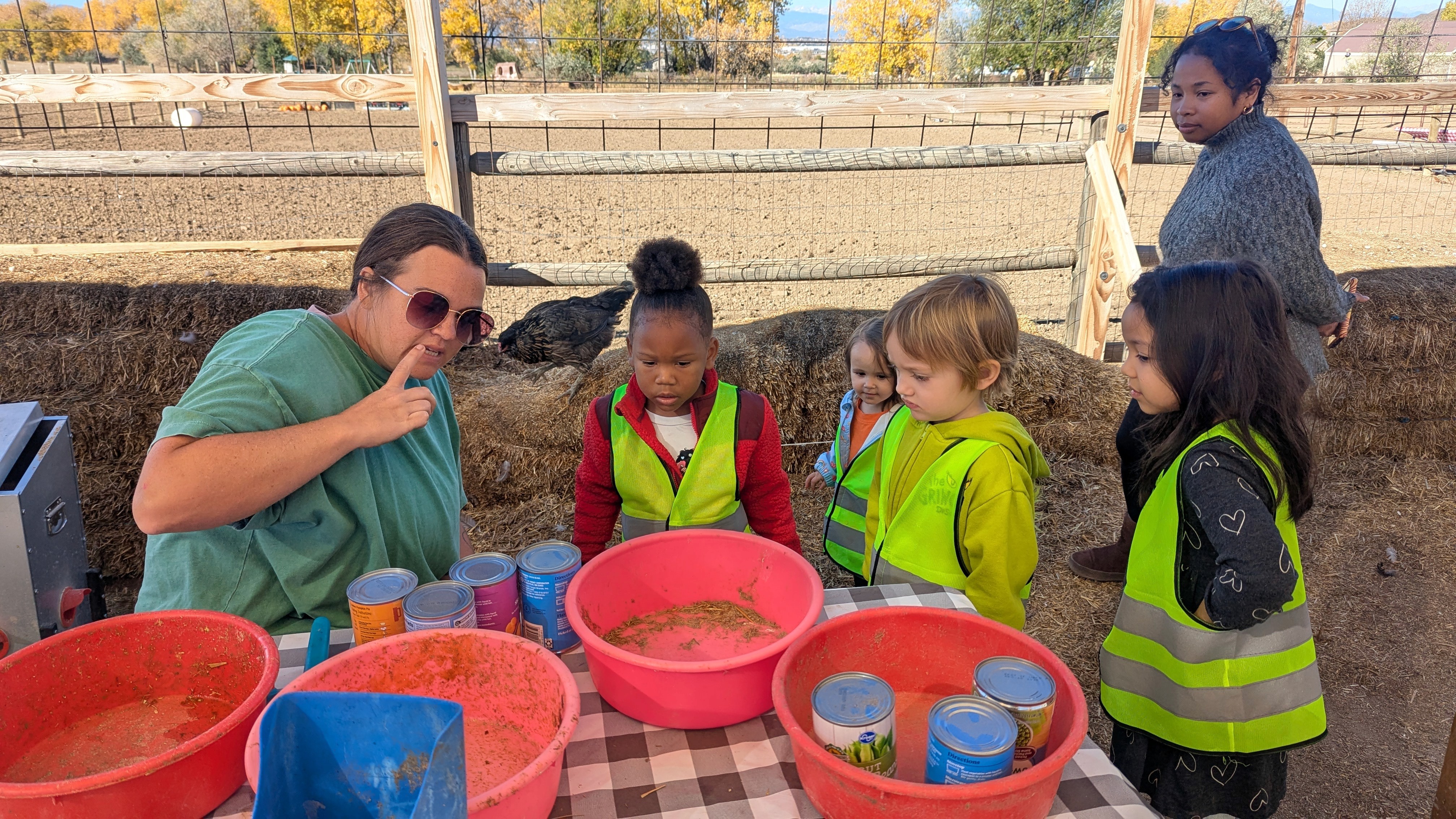a child is drawing on a piece of paper