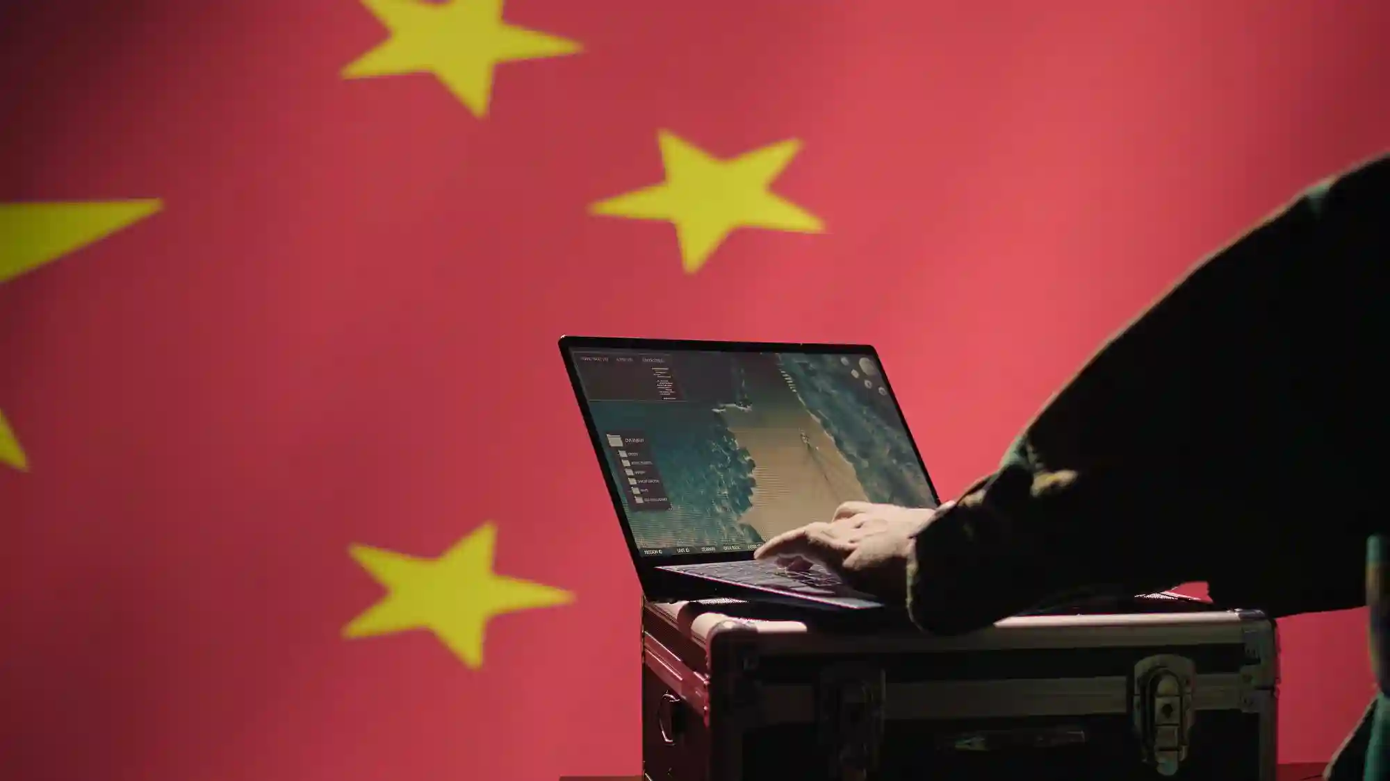 A person using a laptop to organize global product data for efficient Shopify and Consult Beauté system integration.