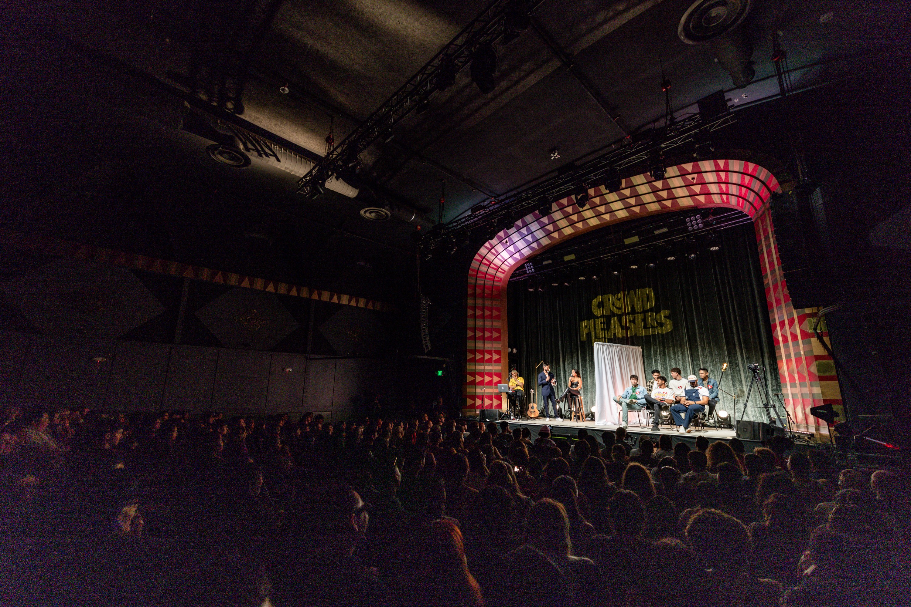 Artistic portrait with red and blue lighting creating a dramatic effect