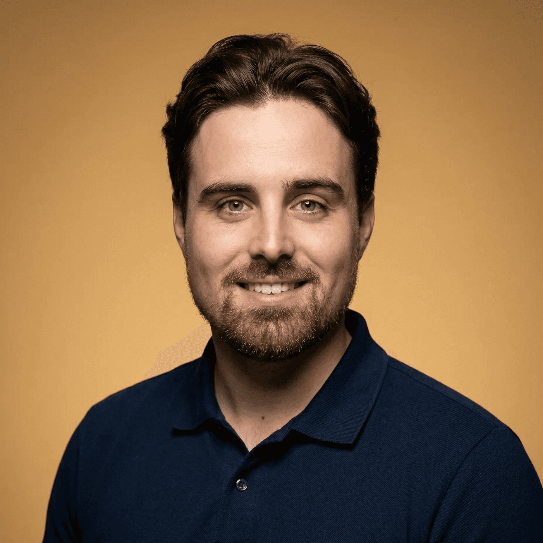 Team member portrait on teal background