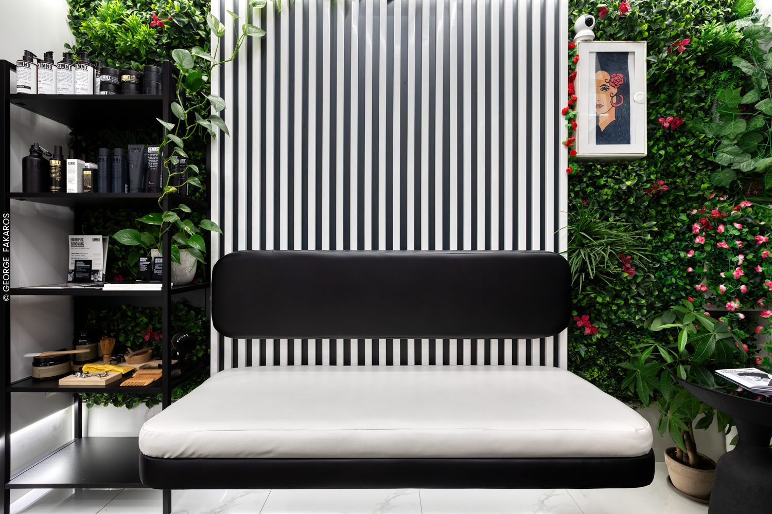 A man getting a haircut with a red comb