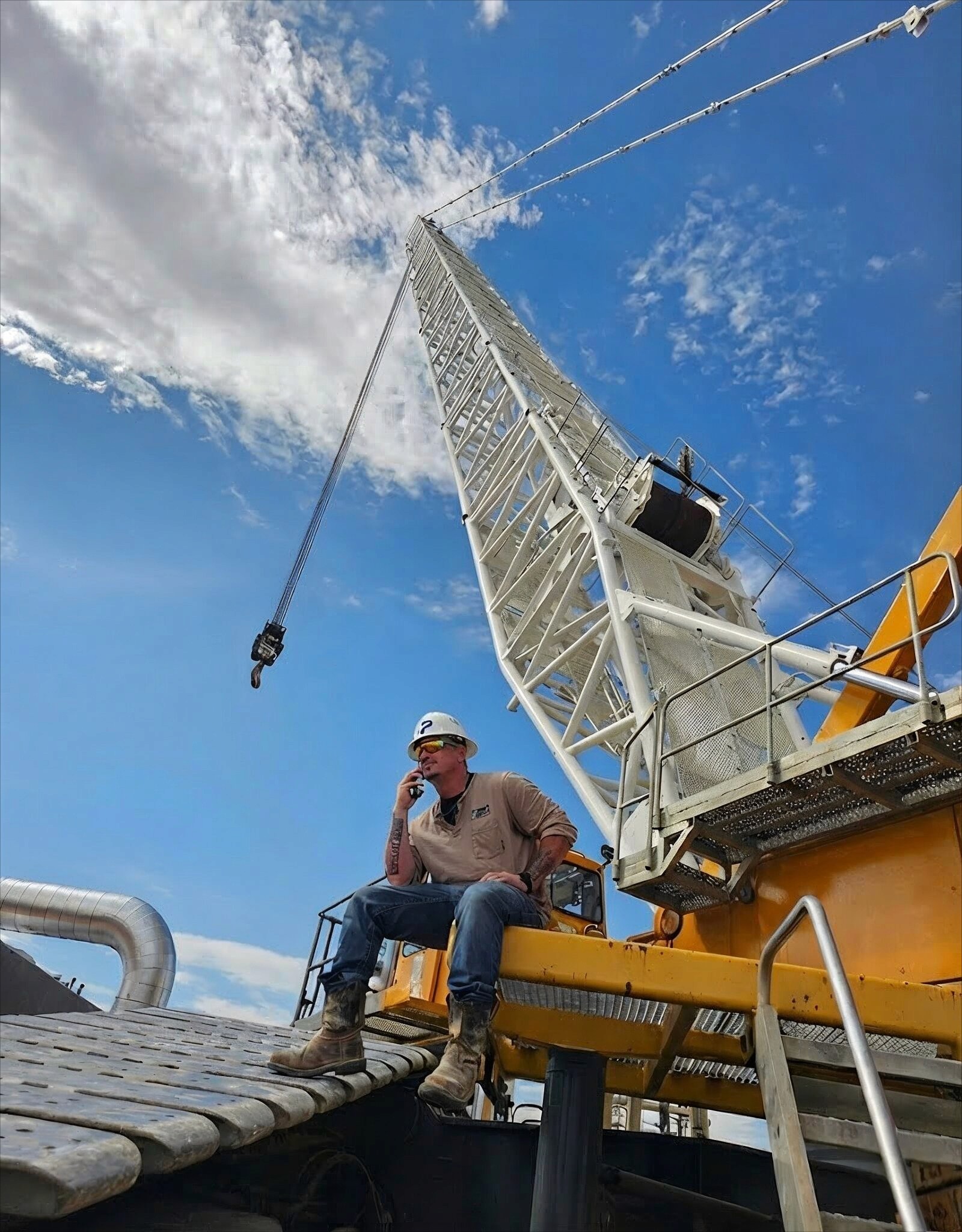 PACE - Man sitting on crane