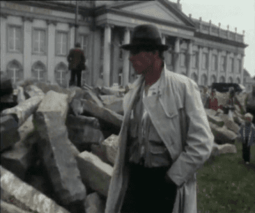 A person in a hat standing next to rocks
AI-generated content may be incorrect.