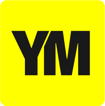 Profile portrait of a man in a white shirt against a light background